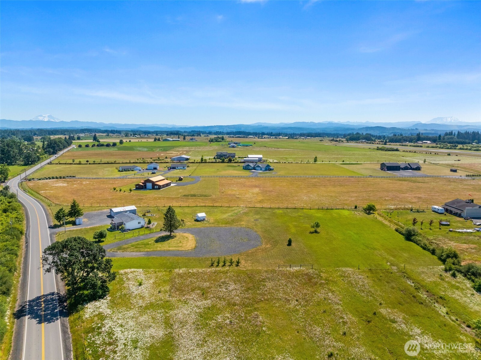 Experience refined country living w/ this rare opportunity to own a property showcasing panoramic dual mountain views.  Set against a breathtaking natural backdrop, the expansive grounds feature a well-appointed shop, charming chicken  coop, and ample space for curated gardens & outdoor entertaining. With potential for an ADU, this estate offers  exceptional flexibility-ideal for multigenerational living, guest accommodations, or added investment value. Located just  moments from a local airfield, the property also offers an ideal retreat for aviation enthusiasts. Whether you're an investor  seeking a premier parcel or envisioning the perfect site to build your dream estate, this property blends rustic elegance w/  limitless opportunity.