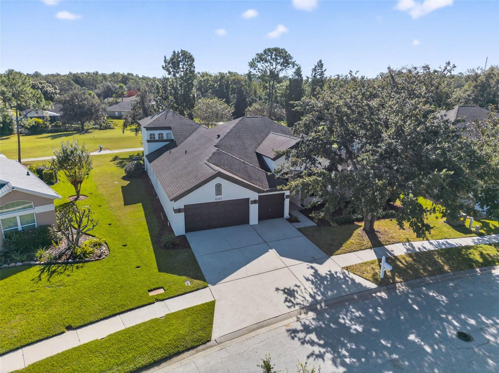 Experience resort-style living in this beautifully upgraded 5 bedroom + Office, 4 bath, POOL home nestled in a pristine GATED golf course community. Perfectly positioned with expansive views of the green, this home combines elegant design with a tranquil setting, offering a rare opportunity to feel like you're on vacation every single day. The love and warmth of this home beams throughout. From the moment you step through the front door the spacious you're greeted with natural light and the flexible floor plan flows seamlessly from room to room. Both a formal living room AND a family room provide plenty of space for gathering with loved ones or finding quiet corners to relax. The custom built ins, fireplace and plantation shutters are just some of the many special touches that make this home truly sing. The renovated kitchen is the heart of the home, thoughtfully designed with luxe stone countertops, new cabinetry, modern hardware, and premium Bosch appliances: plus those extras we can't live without--wine fridge, range hood, and storage space for days. Whether hosting family dinners or casual get-togethers, this space invites both comfort and conversation. The oversized primary suite feels like a personal spa retreat, complete with a large walk-in shower, soaking tub, and generous space to unwind. Additional bedrooms are well-appointed and versatile, ideal for guests, a home office, creative spaces, making this home as functional as it is beautiful. Step outside to your own private backyard paradise, where a newly remarcited pool and hot tub overlook the lush green of the golf course. Completely refinished, resurfaced and all new equipment in 2025, this resort-style outdoor space is perfect for both quiet mornings and lively weekend gatherings. This serene retreat is entirely your own, offering the ultimate in privacy and relaxation. 
Located in the quiet, impeccably maintained community, this property offers low-maintenance luxury with community features such as community pool, basketball, playground, gated, and so on! Major upgrades on this home are already complete, including a newer roof (2019) and HVAC (2017). Just minutes away, you’ll find Tampa Premium Outlets, The Shops at Wiregrass, AdventHealth Center Ice, fine dining, and top-rated A schools. With premier healthcare systems such as AdventHealth, BayCare, and the upcoming Johns Hopkins Children’s Hospital nearby, every convenience is at your fingertips.
This is more than a home — it’s a peaceful retreat designed for those who value space, comfort, and the beauty of Florida living. Here, you can spread out, unwind, and enjoy the best of Tampa. Schedule your private tour today to see this stunner for yourself!