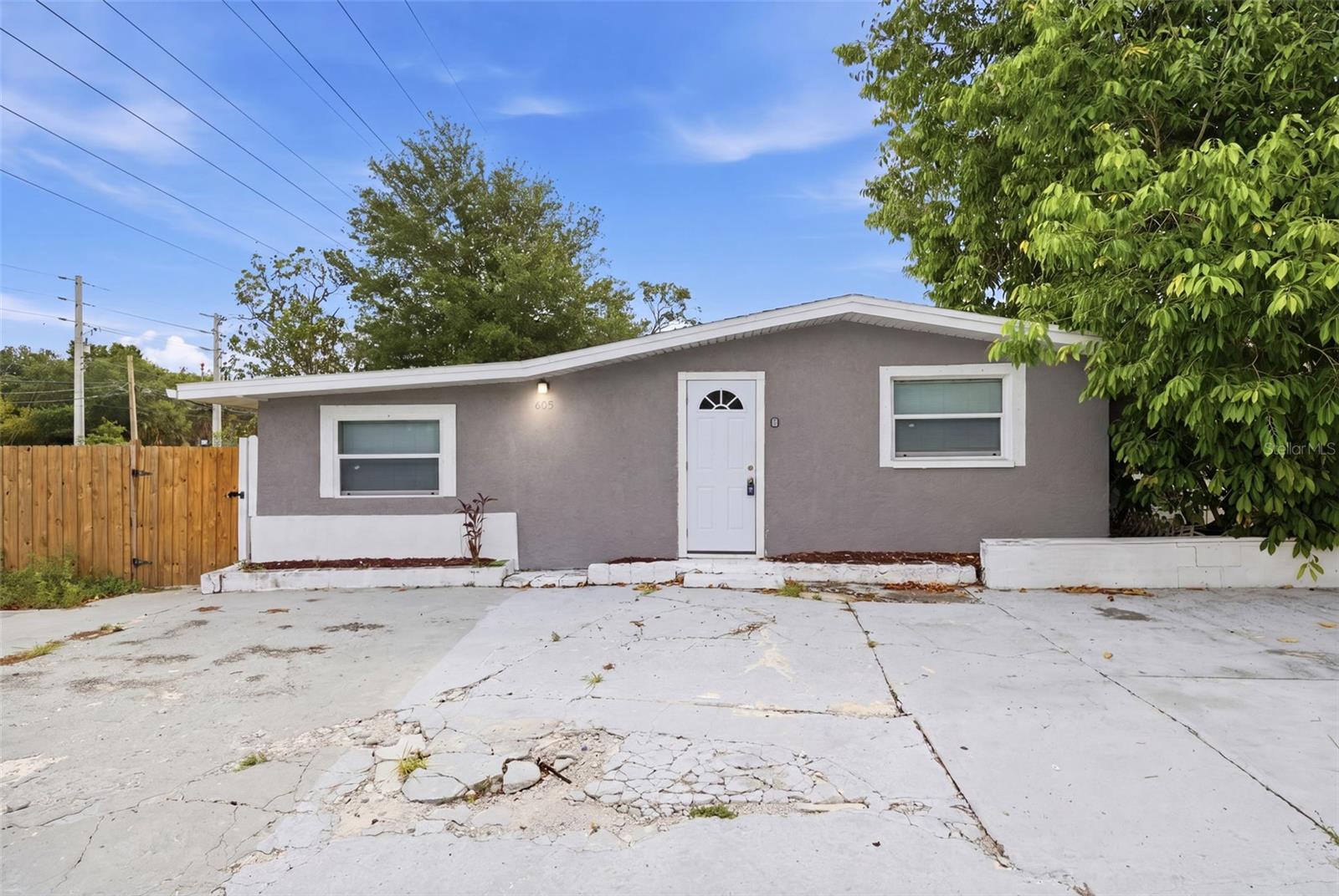 Welcome to 605 S Disston Ave — a versatile multi-unit property in the heart of Tarpon Springs offering comfort, flexibility, and income potential. This well-maintained home features a spacious 3-bedroom main residence with updated flooring, bright living spaces, and a functional layout ideal for everyday living. The property also includes a separate mother-in-law suite, perfect for extended family, guests, or rental use.Situated on a corner lot, this residence provides ample parking, privacy, and outdoor space. With no HOA, you have the freedom to use the property as you choose — live in one unit and rent the other, create a multi-generational setup, or operate as an investment property. Located minutes from downtown Tarpon Springs, the Sponge Docks, parks, beaches, and top local dining, this home offers both convenience and long-term value.Whether you’re seeking a primary residence with added flexibility or a property with built-in income potential, 605 S Disston Ave delivers a rare opportunity in a highly desirable location.