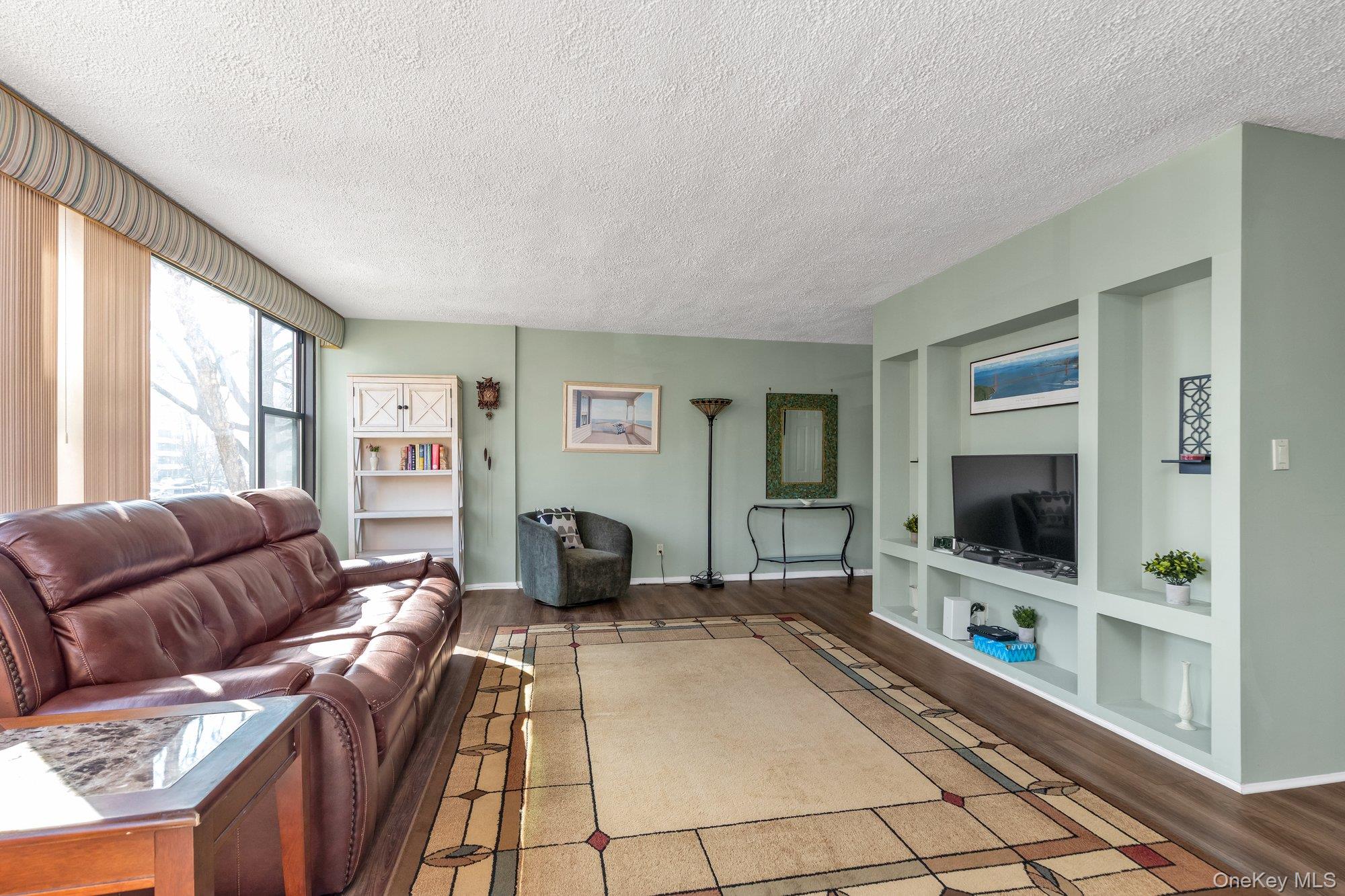 Eastern exposure with partial water/bridge views.  Open concept kitchen with granite countertops, stainless appliances, maple cabinets and tiled backsplash.  Walk in closet as you enter with built in storage.  Laminate flooring.  Spacious rooms with abundance of natural light. Prime parking available for transfer.  Lehavre offers tennis, swimming pools, tennis, clubhouse with gym and playgrounds.