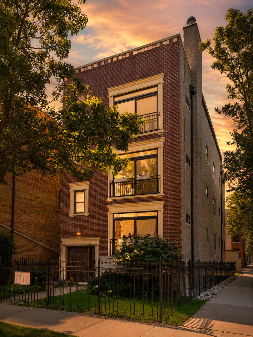 EXCEPTIONAL 2400 SQUARE FOOT THREE-BEDROOM, TWO-BATH PENTHOUSE DUPLEX-UP IN UKRAINIAN VILLAGE, COMPLETE WITH TWO PRIVATE ROOFTOP DECKS, UNOBSTRUCTED CITY VIEWS AND INCLUDED GARAGE PARKING! The main level offers a bright, open layout designed for both everyday living and entertaining. The spacious living and dining areas feature hardwood floors, crown molding, a Juliet balcony and a gas fireplace framed by a dramatic floor-to-ceiling tile surround. The open kitchen provides abundant white cabinetry, granite countertops and backsplash, stainless steel appliances and a breakfast bar for casual seating. Positioned at the rear of the home, the primary suite feels private and peaceful, with its own balcony, a generously sized closet with custom shelving and a spacious ensuite bath featuring a jetted soaking tub, separate rain shower with an additional showerhead and a large vanity. The second bedroom is also located on the main level, along with a full guest bath and in-unit laundry. Upstairs, the flexible third bedroom can easily function as a family room, home office, guest suite or a combination of uses. This level opens directly to two private rooftop decks, redone in 2024 and situated on opposite sides of the home, creating separate spaces for grilling, dining, lounging and taking in the skyline views. Located on a quiet residential block near the Ukrainian Village and Humboldt Park border, the home offers easy access to the independent restaurants, cafes and nightlife along Chicago and California avenues, including neighborhood favorites Rootstock, Spinning J and the historic California Clipper. The expansive green space, lagoons and recreational amenities of Humboldt Park are nearby, along with Mariano's and neighborhood markets for everyday shopping. Convenient transportation options include the Chicago Avenue and California Avenue CTA buses, the Western Avenue Metra station and easy access to surrounding neighborhoods and downtown. Pet-friendly building.  Set up your showing today!