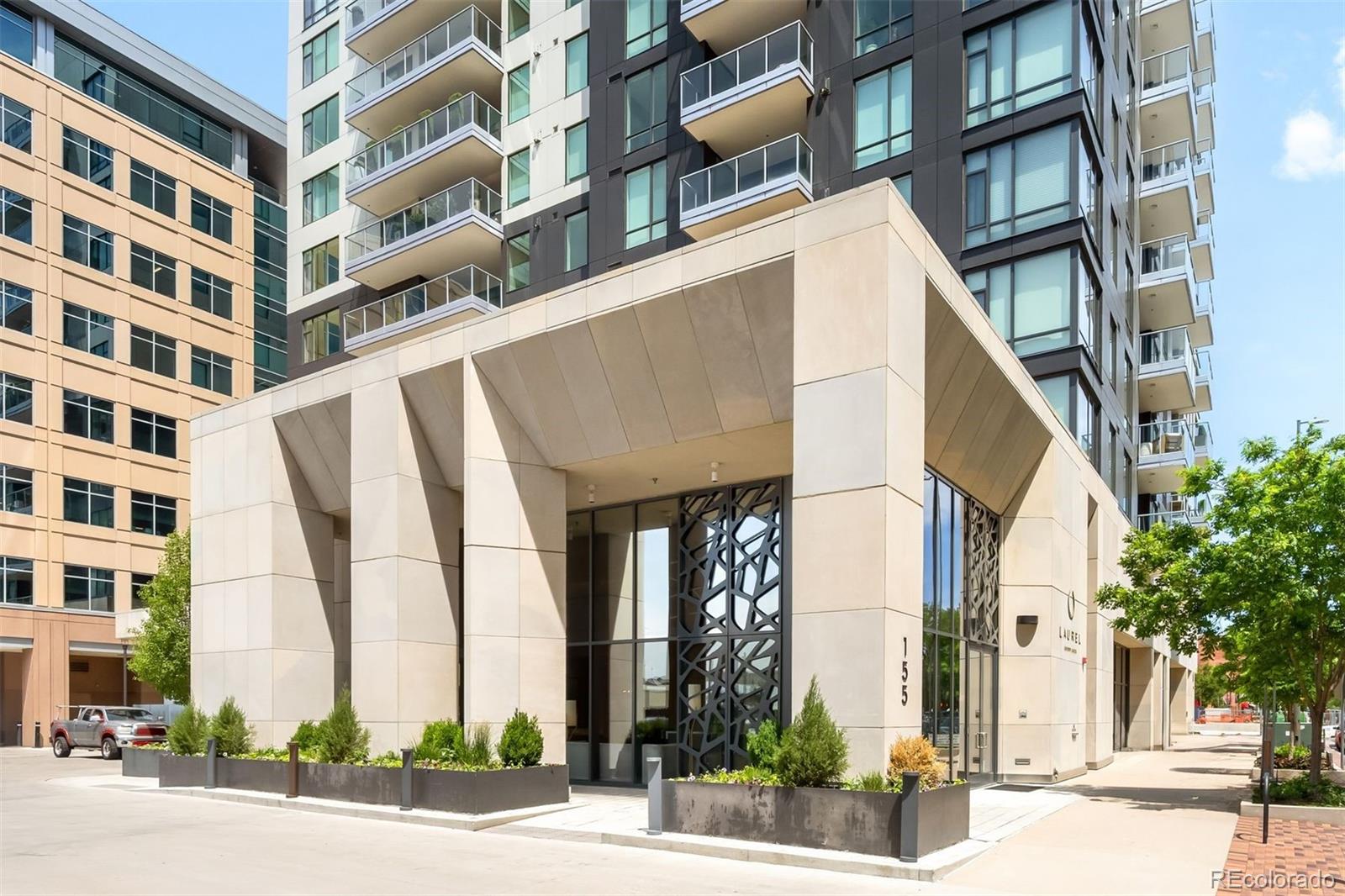 Perched on the 10th floor of The Laurel, this exceptional residence captures sweeping western views of the mountains and Denver skyline from one of Cherry Creek North's most sought-after full-service buildings. Thoughtfully designed for both full-time and lock-and-leave living, the home includes 2-deeded garage parking spaces and welcomes you with an open-concept floor plan that immediately showcases the view. The beautifully appointed chef's kitchen features premium appliances, custom cabinetry, and refined finishes, while the adjoining living and dining areas flow seamlessly to a private balcony—an ideal setting for entertaining or enjoying Colorado's spectacular sunsets. The primary suite offers a custom walk-in closet, spa-inspired bath, and direct balcony access, while a secondary bedroom and dedicated office provide exceptional flexibility for guests, working from home, or additional living space. Residents enjoy an unmatched level of service with a full-time concierge and an impressive collection of outdoor rooftop amenities, including a year round pool, fire-pits, cooking areas, and beautifully designed gathering spaces with panoramic city and mountain views. Just outside your door, Cherry Creek North's acclaimed restaurants, luxury boutiques and shopping, art galleries, and neighborhood amenities are all within walking distance, creating one of Denver's most vibrant and walkable lifestyles. Combining security and exceptional service this residence presents a rare opportunity to experience luxury living with unmatched convenience.