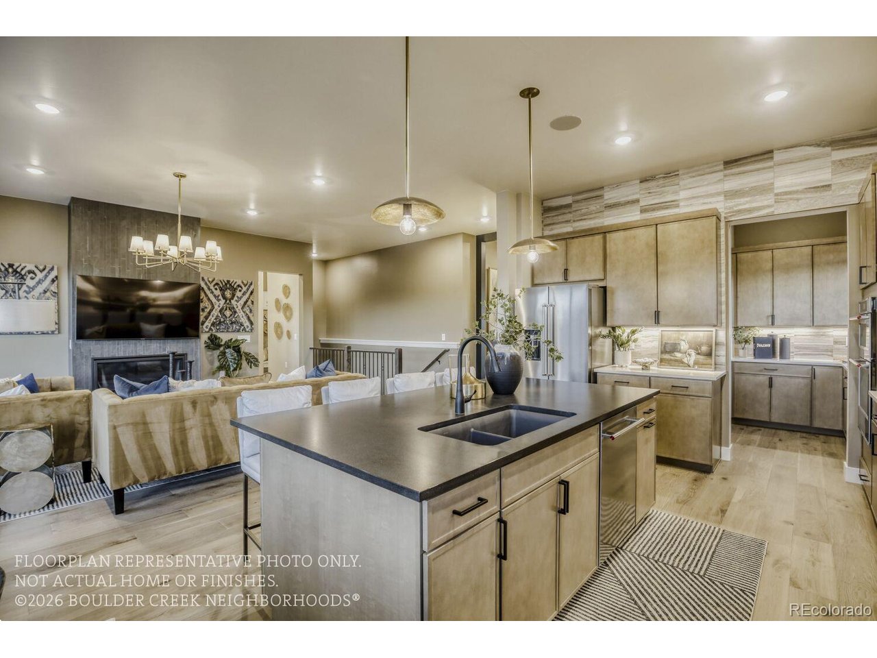 Welcome to Sonders Fort Collins' premier lakeside community designed for connection, convenience, and comfort. This brand-new ranch-style home offers main-floor living at its best, blending modern design with thoughtful efficiency.The main floor is designed with you, the owner in mind. Featuring an open-concept great room, gourmet kitchen, bright dining area, private primary suite, and a an additional main floor guest room. The finished lower level offers a comfortable retreat for guests, complete with spacious living areas, bedrooms, and a wet bar, perfect for entertaining or relaxing in style.Enjoy private access to Richards Lake, where residents can kayak, paddleboard, or simply unwind by the water-all just steps from your front door. The low-maintenance lifestyle at Sonders means more time for what matters most, with lawn care and snow removal handled for you.Conveniently located near Old Town Fort Collins, I-25, and local trails, Sonders offers the ideal balance of nature, neighborhood, and new-home living. Discover the perfect blend of simplicity and sophistication schedule your visit to Sonders today! Home is Under Construction. Photos of Model. Move in November 2026.