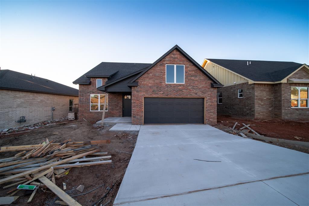 Picture this: mornings on a back porch surrounded by trees -- fresh air, privacy, and a peaceful backdrop that’s nearly impossible to find in new construction. This home sits on one of Echo Park’s most desirable lots, offering a rare natural setting paired with an Edmond address, Deer Creek Schools, and the benefit of OKC utilities.Built by Urban Nest Homes, the property showcases elevated construction standards at every turn: an engineered post-tension foundation, 96% efficient HVAC with whole-home air filtration and exterior fresh-air intake, tankless water heater, Hardie siding and trim, upgraded windows, premium plumbing and lighting fixtures, and enhanced insulation designed for everyday comfort and long-term efficiency. Every detail reflects thoughtful craftsmanship and a commitment to quality.Inside, the home offers intentional layout designs, natural light, and modern finishes that create a clean, elevated feel throughout. Outside, low-maintenance living meets a private treed backdrop that instantly stands out in the neighborhood.Echo Park is quickly becoming one of the area’s most lifestyle-driven communities, with planned amenities that include a playground, basketball court, swimming pool, dog park, pickleball court, and walking trail. With a quiet residential setting, high-demand schools, OKC utilities, and convenient access to major highways, shopping, and dining, this location blends comfort, convenience, and community in a way that’s hard to beat.