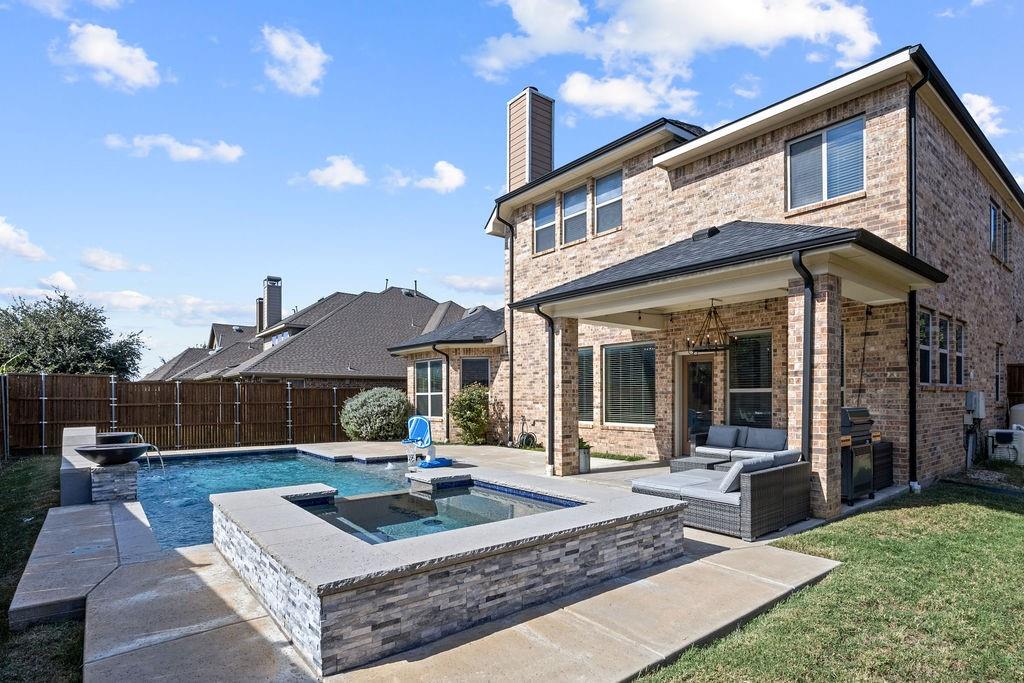Proudly offered by its original owner, this beautiful David Weekley home located in the desirable Stonewater Crossing community and zoned for Wakeland High School combines thoughtful design, spacious living, and exceptional outdoor amenities. Recent updates include brand new, high end carpet and fresh interior paint, creating a fresh, move in ready feel throughout. The first floor features a spacious private office, an inviting eat in kitchen with an oversized island, and a bright, welcoming living room perfect for everyday living and entertaining. The primary suite offers a relaxing retreat, while an additional downstairs bedroom and full bathroom provide an ideal setup for guests or multigenerational living. Upstairs, you'll find three additional bedrooms, a generous game room, and a dedicated media space. Step outside and enjoy a heated pool and spa, complete with a tanning ledge and waterfall. Residents of Stonewater Crossing also enjoy fantastic community amenities, including a pool, splash pad, playground, BBQ area, clubhouse, fishing, and trails. From its original owner pride and recent upgrades to its resort style backyard and flexible floor plan, this exceptional home is ready to welcome its next owner.