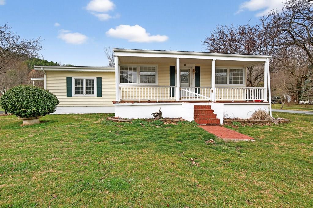 Want to live in the heart of Damascus? Welcome to 205 S Beaver Dam Ave, a delightful residence nestled in the picturesque town of Damascus. This inviting home offers a perfect blend with an **Outdoor Oasis:** Enjoy the serene front porch with views of the VA Creeper Trail, the Appalachian Trail, and Damascus Town Park, play, hike, or bike ride, or just simply unwind after a long day.  of modern comfort and rustic charm, making it an ideal retreat for families and nature lovers alike. The generous living area is perfect for relaxation and entertaining. The kitchen is equipped with modern appliances and ample counter space, making meal prep a breeze. This home boasts 2 cozy bedrooms and 2 full baths. and bonus space to accommodate a home office or craft room.     **Prime Location:** Situated in a friendly neighborhood, you'll be close to local amenities, restaurants, parks, and walking trails, making it easy to enjoy the best that Damascus has to offer. - Welcoming community with a small-town feel. Don't miss out on this wonderful opportunity to call 205 S Beaver Dam Ave your new home! Schedule your tour today to experience all the charm and comfort this property offers.