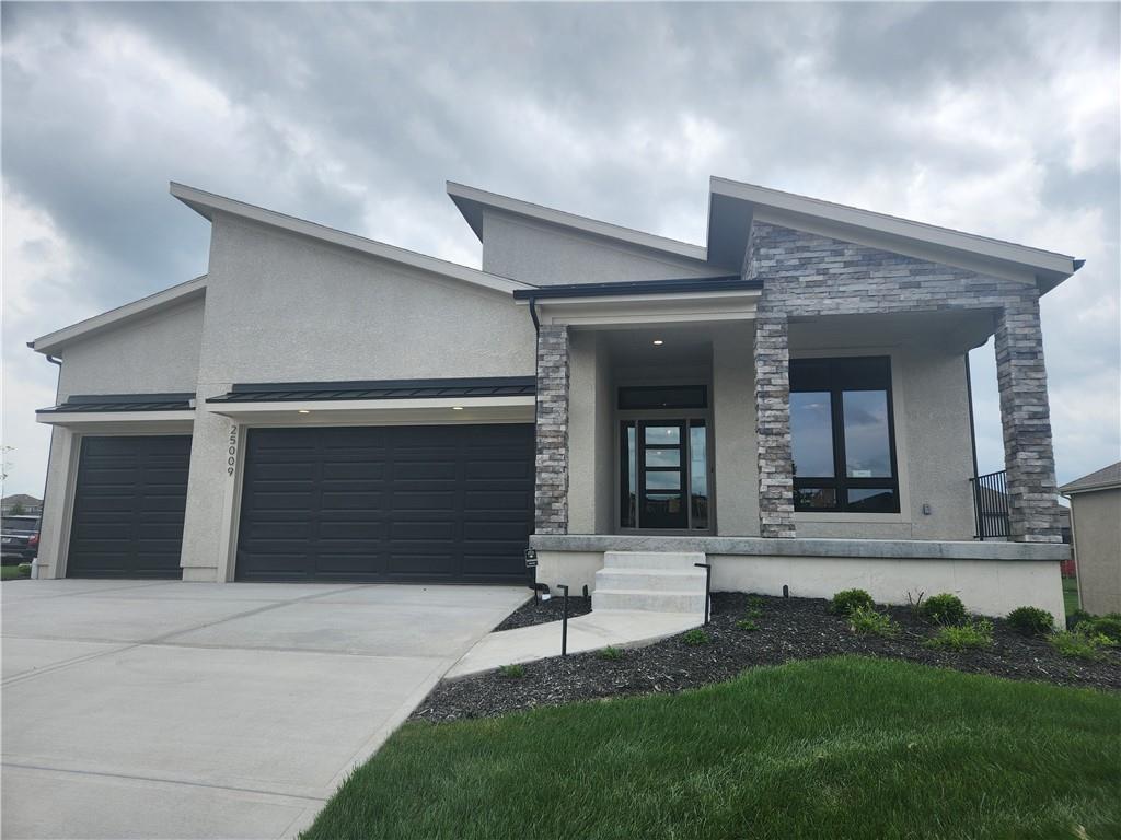 MODEL HOME FOR SALE!!! Stunning "Richmond" plan by Gabriel Homes with New Modern front elevation. This one has it all! Gorgeous kitchen with upgraded appliances, oversized pantry and a large island open to the bright great room with fireplace. Entertain on your covered deck with steps down to a large stamped concrete patio with a firepit. The primary bedroom is on the main level and the primary bath even has a heated floor for your comfort. The laundry area is conveniently located next to the huge primary closet. Completing the main level is a 2nd bedroom/office with built-in shelves. The lower level is a bright daylight and has a comfortable recreation room perfect for watching the big game by the fireplace and includes a wet bar. You'll find two more bedrooms and third bath perfect for your guests. There are way too many upgrades to list for this outstanding home. This home is in a beautiful maintenance provided area of Cedar Creek with full access to Cedar Creek clubhouse with party room, exercise room, 3 pools, 65-acre fishing lake, parks, pickleball courts, walking trails and more. Taxes are estimated.