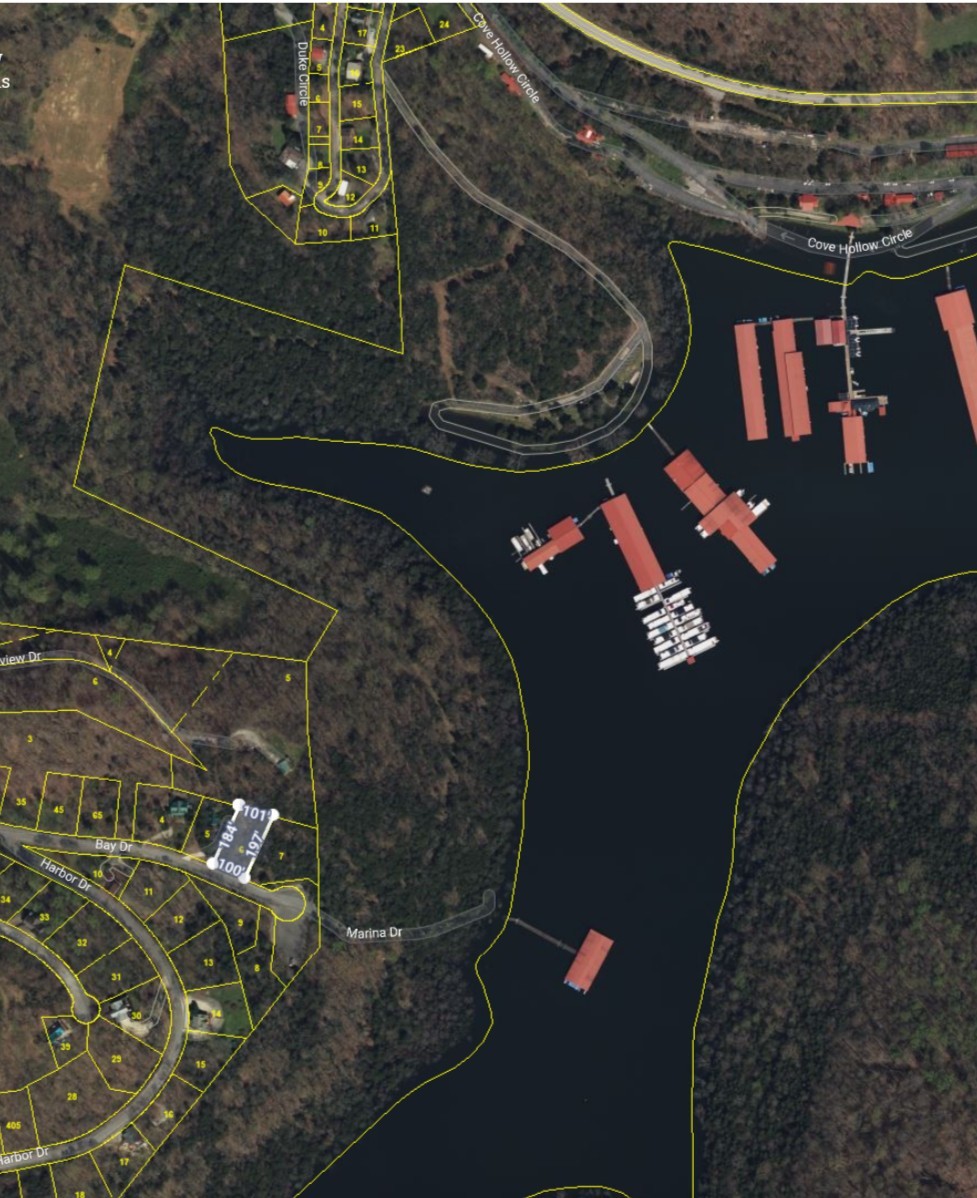 Located in the highly sought-after Cove Hollow development, this exceptional lot is just moments from Center Hill Marina—making it the closest residential community to the water’s edge. This is the second lot closest to the private convenience dock, which is reserved exclusively for owners within the development—offering unmatched ease for setting out on your lake adventures. Tucked within a scenic and peaceful setting, the property provides the perfect spot to build your dream getaway or full-time home. Just 8 miles from I-40 (Exit 268), you’ll enjoy quick access to the interstate while still soaking in the serenity of lakeside living.Don’t miss this rare opportunity to own in one of Center Hill Lake’s premier communities! Must have a Realtor present to view due to the gate access.