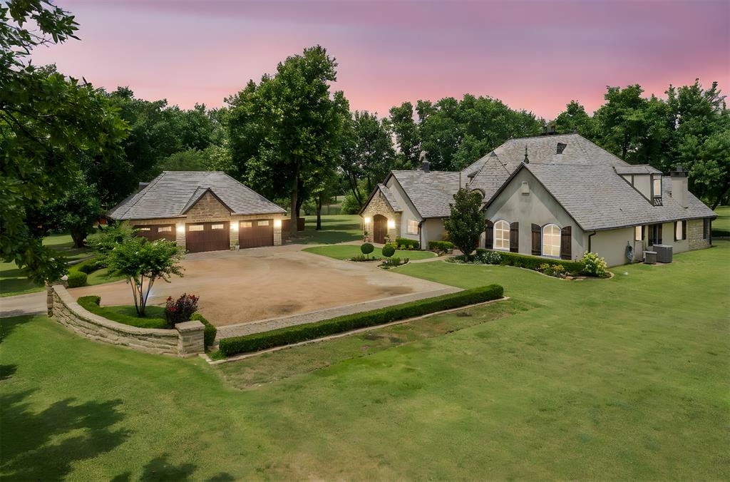 Prepare to FALL IN LOVE with this STUNNING FRENCH COUNTRY ESTATE nestled on 5 PRISTINE ACRES with a POND VIEW — and NO HOA! This ONE-OF-A-KIND EQUESTRIAN PROPERTY has been METICULOUSLY REIMAGINED, showcasing EXCEPTIONAL CRAFTSMANSHIP and UNPARALLELED ATTENTION TO DETAIL. Step into REFINED ELEGANCE, where HAND-SCRAPED WIDE-PLANK HARDWOOD FLOORS flow seamlessly throughout. CUSTOM WOODWORK and EXQUISITE CAST STONE FINISHES adorn the WALLS, ARCHWAYS, and the DRAMATIC FIREPLACE SURROUND, setting a tone of SOPHISTICATION in every room. The GOURMET CHEF’S KITCHEN features THERMADOR APPLIANCES, including a COMMERCIAL-STYLE GAS COOKTOP and BUILT-IN REFRIGERATOR—perfect for both ENTERTAINING and everyday living. The MASTER SUITE offers a SPA-LIKE EN-SUITE BATHROOM with IMPORTED MARBLE TILE, plus a SUNROOM WITH FIREPLACE that can double as a HOME OFFICE. Outside, the FABULOUS DAVINCI ROOF is accented with HAND-CRAFTED COPPER DETAILING. An EXPANSIVE 3-CAR GARAGE provides AMPLE STORAGE, while the grounds boast a PICTURESQUE POND VIEW and a 12x22 OUTBUILDING. Enjoy ENERGY EFFICIENCY with WHOLE-HOME SPRAY FOAM INSULATION, NEW ELECTRICAL WIRING, PEX PLUMBING, ZONED HVAC, and a PROPANE-FUELED FIREPLACE for year-round comfort. Located in the MOORE SCHOOL DISTRICT with EASY ACCESS to ALL OKC HAS TO OFFER—just MINUTES FROM THE AIRPORT! This is more than a HOME—it’s a LIFESTYLE. NO DETAIL has been overlooked in creating this MASTERPIECE OF LUXURY AND CHARM.

YOUR DREAM HOME AWAITS — SCHEDULE YOUR SHOWING TODAY!
