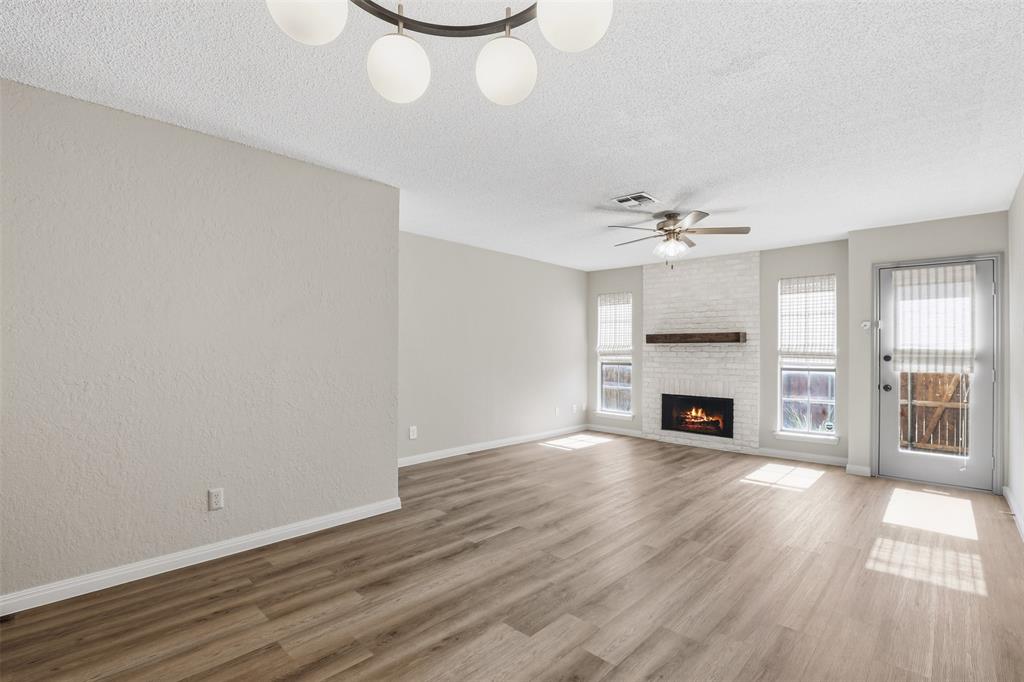 Discover the perfect blend of comfort and convenience in this beautifully maintained 2- story townhome! This home offers 2 bedrooms, 1 full bath, and 1 half bath with updates to bathrooms and kitchen in November of 2024. The living area includes a wood-burning fireplace with access to the private backyard with a concrete patio, flowerbeds, and wooden fence. Covered carport parking is located at the rear of the home. Conveniently located near Hulen Square and the Chisholm Trail Parkway for easy commuting.