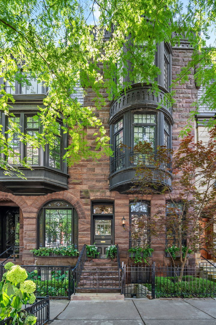 In Chicago's coveted Gold Coast historic district, Elm Street is considered a premier block for distinctive row houses and greystones. Off Lake Shore Drive and a short walk to some of Chicago's best schools, shops, and restaurants, it's a dream location for an enjoyable urban lifestyle. At home at 55 E Elm, you will find the elegance of 19th century architecture reimagined for the way we live today.  Painstakingly restored and meticulously maintained through the years, the most recent renovation features a modern 20-foot long eat-in kitchen with custom cabinetry and a contiguous lush deck, one of two outdoor spaces. Offering natural light from skylights, French paned doors and windows, and charming bays, the 4,200/SF  home is warm and inviting. There are three large en-suite bedrooms and a fourth bedroom or office in the built-out lower level, a library with French doors opening to a second deck, and a dining room that lives well as a family room. Garage parking options in the neighborhood. Lighting exclusions