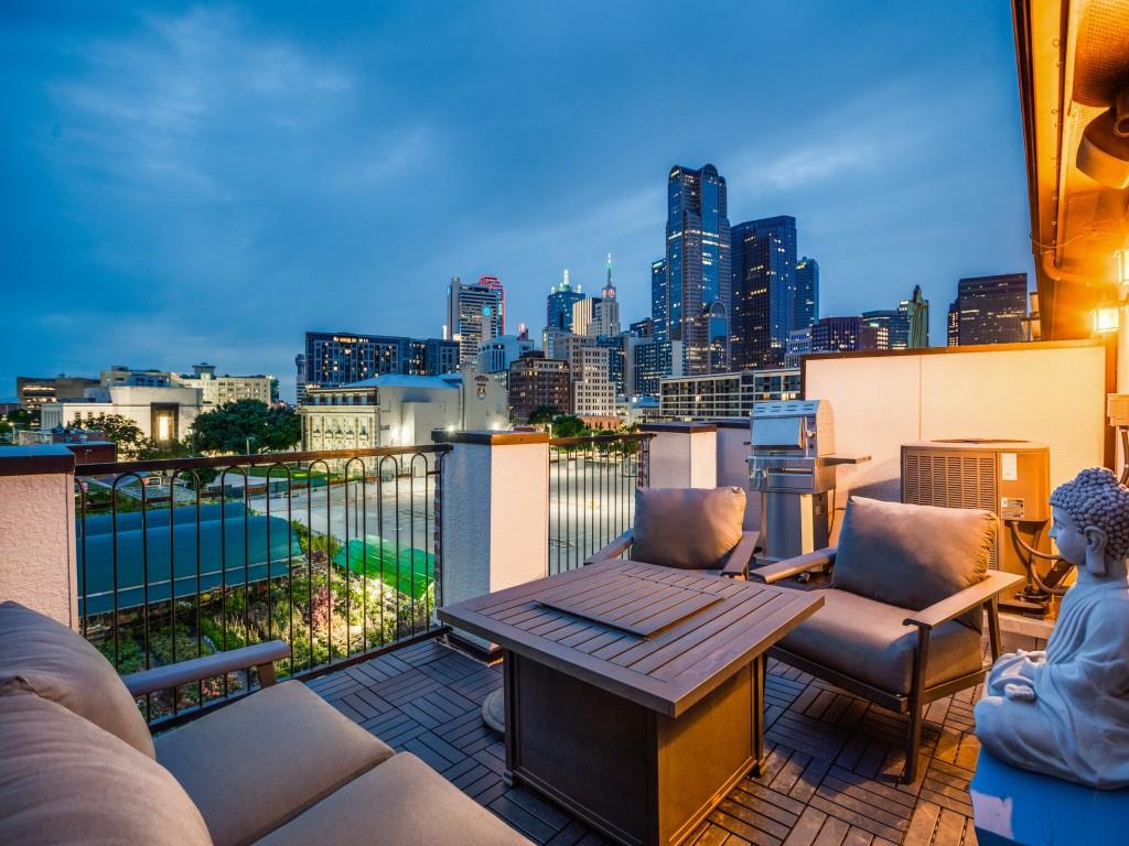 Breathtaking Property in the Heart of the coveted Farmers Market Area. Stunning downtown views from all the front windows and Courtyard views from the back windows. So many sensational custom features. Stunning Architecture with many spectacular updates and designer accents. Featuring an Elevator going from the first to the second and third floors. Beautiful Designer light fixtures! The Foyer opens up the first-floor bedroom with an ensuite bath and large walkin closet could easily be study. The bright and open 2nd floor living areas with 12 ft ceilings and a spacious living room, dining room and gourmet kitchen with quartz countertops, designer backsplash, premium vent hood, wine fridge, updated custom cabinetry, ss Bosch appliances, kitchen island and walkin pantry. Lovely Powder bath next to the living room. Exceptional balcony with new decking and downtown views and of Ruibal's Plants. The Primary bedroom has a great sitting area and a great primary bathroom with separate shower, oversized air spa tub, separate vanities, marble countertops and a custom walkin closet. The third bedroom has an ensuite bathroom. The utility room is off the hallway as well. The fourth-floor rooftop deck has new decking, outdoor speakers and has mesmerizing downtown views! The garage is with epoxy floors and upper storage. This property is right across from Ruibals Plants so you can enjoy all the seasons and has parking in the front of the property. Features Stunning Custom Remote Window treatments with Custom Valances. There are also dimmers in most rooms, great surround sound speaker system on all floors and the rooftop deck. The whole house has surge protectors as well. Many more amenities! Extensive Luxury Upgrades & Enhancements throughout the property.