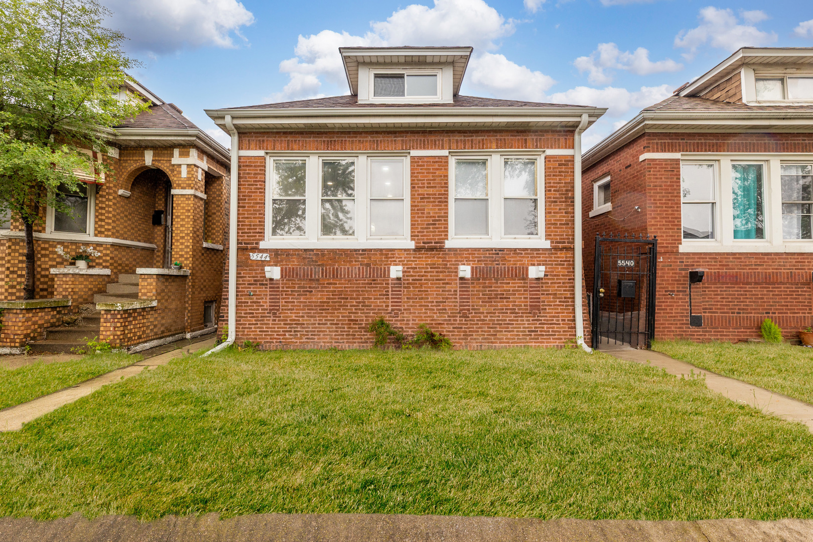 Located in the heart of Gage Park!! Charming & Fully Remodeled Brick Bungalow - A Perfect Blend of Modern Comfort & Convenience!  This beautifully updated 5-bedroom, 3-bathroom home offers the ideal combination of style and functionality. Step inside to discover spacious, refinished living areas, including a welcoming living room, elegant dining room, and a fully renovated kitchen designed with entertaining in mind.    The home features a luxurious master suite complete with a private bathroom and relaxing jacuzzi tub. A fully finished basement and versatile attic provide additional space for living, working, or storage. newer windows throughout help keep the home comfortable and quiet year-round.*Water heater, furnace and AC are about 5 years old *Roof less than 10 years old.  Outside, enjoy a large 2-car garage with plenty of room for vehicles and extra storage. This turnkey home is move-in ready-schedule your showing today and experience it for yourself!