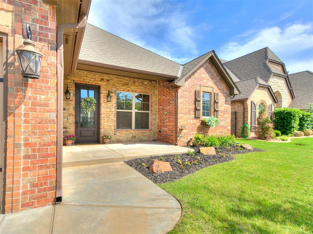 Welcome to this stunning, move-in-ready home tucked away on a family-friendly street in one of the most sought-after neighborhoods! With 5 spacious bedrooms, including an upstairs suite with its own half bath, there's room for everyone. Step inside and fall in love with the open-concept layout, designer hardwood floors, and elegant double crown molding that tie together the living, dining, and island kitchen areas—perfect for entertaining. The gourmet kitchen boasts a large center island with bar seating, and flows seamlessly into the dining and living spaces. The master suite is a true retreat with newer carpet, a spa-like ensuite featuring a jetted tub, and a custom oversized closet. Additional highlights include a built-in office nook near the entryway, a storm shelter in the garage floor, and HVAC systems for both levels. Outside, enjoy the extended patio, 8-ft privacy fence, and 10x14 storage shed—ideal for relaxing or hosting. Neighborhood perks include a community pool, clubhouse, and a stocked fishing pond. Minutes from shopping, dining, and top-rated schools—this location is unbeatable!