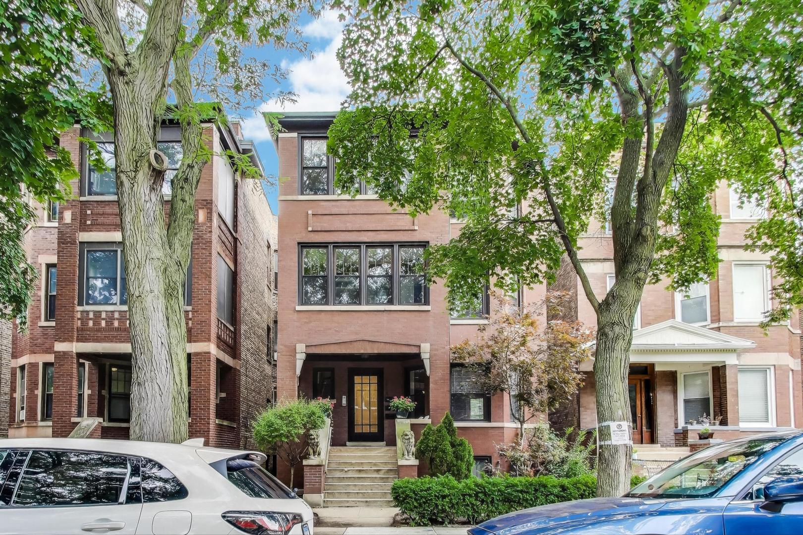 Vintage soul. Modern style. Andersonville at its best! This residence pairs timeless finishes with a thoughtful layout on one of the neighborhood's most picturesque blocks. Here, you're steps from vibrant cafes, boutiques, restaurants, easy transportation, and the lake - everything you love about city living at your doorstep. Inside, this home offers a two-bedroom, two-bath floorplan filled with character. The open white kitchen features quartz countertops and stainless appliances, flowing effortlessly into a sunny dining/sunroom - perfect for morning coffee or dinner with friends. The living room stands out with custom built-ins, a gas fireplace, and an elevated trim package that enhances that true vintage feel. The primary suite provides a retreat, while the versatile second bedroom with a built-in Murphy bed adapts beautifully to guests or a home office. Practical perks make life even easier: tandem parking for two full-size cars or SUVs and the option to purchase the home fully furnished with unique mid century modern pieces to curated designer furniture for a seamless move-in. From friend filled evenings on your big back deck to lively weekends out on Clark Street, this home makes it all possible.