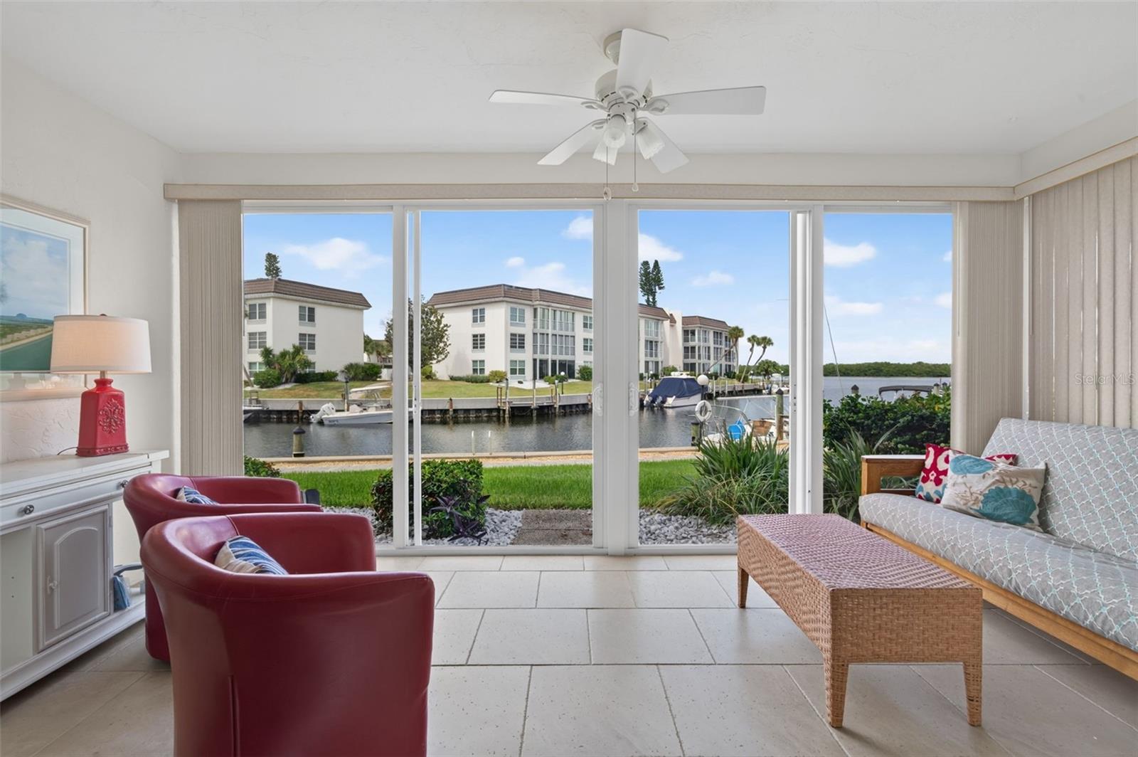 First time on the market in 25 years! This turnkey, first-floor, 2-bedroom, 2-full-bath condo in gated LongboatHarbour has hosted a lifetime of memories and is ready for its next chapter. Freshly painted and move-inready, it opens through a glass-enclosed lanai straight onto the lawn and harbor, with boats docked steps awayand Sarasota Bay beyond. Tile floors, plantation shutters, and a bright white kitchen with a pass-through to thedining area keep life easy. Being on the ground floor, you skip the elevator and stairs and walk right out to thepool, your covered parking, and the path to the beach. Owners report no flood damage in their 25 years ofownership. Amenities include heated pools, fitness center, sauna, billiards and game rooms, clubhouse, puttinggreen, shuffleboard, fishing pier, grills, kayak storage, and a private Gulf-side beach house across Gulf ofMexico Dr with parking, restrooms, showers, and gear storage. Bayside sunrises, Gulf sunsets, Publix anddining nearby, SRQ about 13 miles. Owner financing available, ask for terms. Quick close possible. Approx.$15K in 2027 rental bookings already in place.