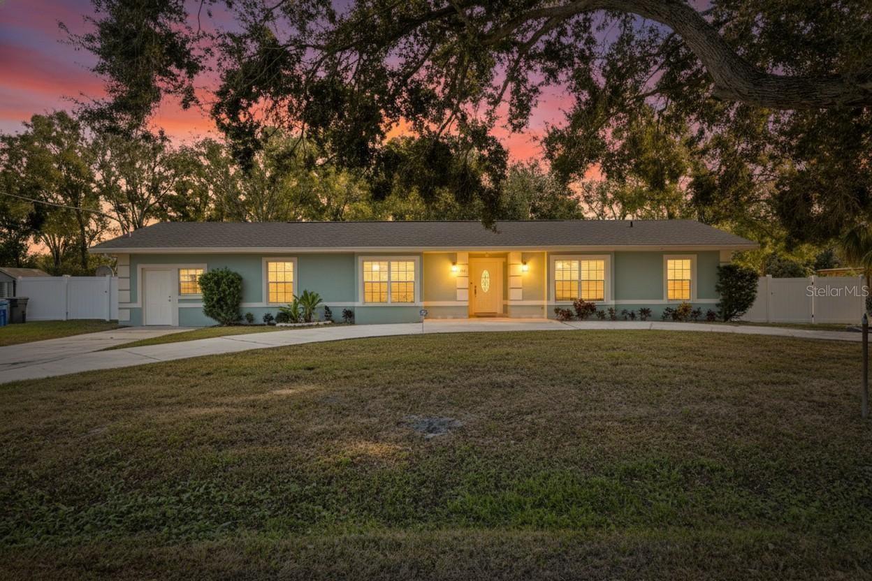 One or more photo(s) has been virtually staged. Flexible Multi-Generational Living with Rental Opportunity – Nearly ½ Acre, No HOA or CDD!Discover extraordinary space and versatility in the heart of Tampa, just moments from the Selmon Expressway and US-301. Set on nearly half an acre, this rare property features a 3-bedroom, 2-bath main home PLUS a 1-bedroom, 1-bath attached apartment with private entrance and central A/C—perfect for extended family, in-law suite, guest quarters, or potential rental income.A picturesque mature front tree welcomes you to the pavered entryway, setting the tone for the home’s warm curb appeal. Inside, you’ll find updated bathrooms, vinyl plank flooring, stainless steel appliances, and smart improvements including:NEW Roof (2024)Remodeled bathroom (2025)AC replaced in 2014Bring your RV, boat, trailer, or work vehicle—there are no HOA or CDD restrictions, offering unmatched flexibility. The fully fenced backyard provides privacy and room to expand, garden, or simply unwind. A screened rear lanai opens to a separate laundry/storage room, giving the home a functional flow for everyday living or multi-unit use.Whether you’re looking to entertain, accommodate multiple generations, or create an income-producing opportunity, this property delivers endless potential in one of Tampa’s most accessible locations.Your canvas to customize—or your opportunity to invest—this unique home is truly a rare find.