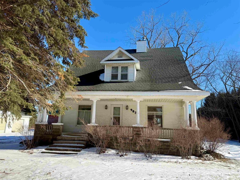 Welcome to your dream country retreat! This charming two-story home sits on 18 acres-9 acres tillable and 7 acres of pasture-surrounded by majestic maple trees and other mature hardwoods. The property provides peace, privacy, and endless opportunities to enjoy the outdoors. Inside, youll find a warm and inviting home filled with unique character, complemented by modern updates such as a newer furnace and an updated septic system. The outbuildings add even more appeal: a spacious hip-roof barn ideal for storage, hobbies, or livestock, plus a detached 32 x 24 two-car garage and stone garage. Whether you envision a hobby farm, a private getaway, or simply more room to roam, this property delivers. With its scenic setting and timeless country charm, this home is truly one-of-a-kind. The 7 acers are current rented out, the owner & renter will be retaining the 2025 crops. There is also a transferable solar payment that is made to the sellers each year.