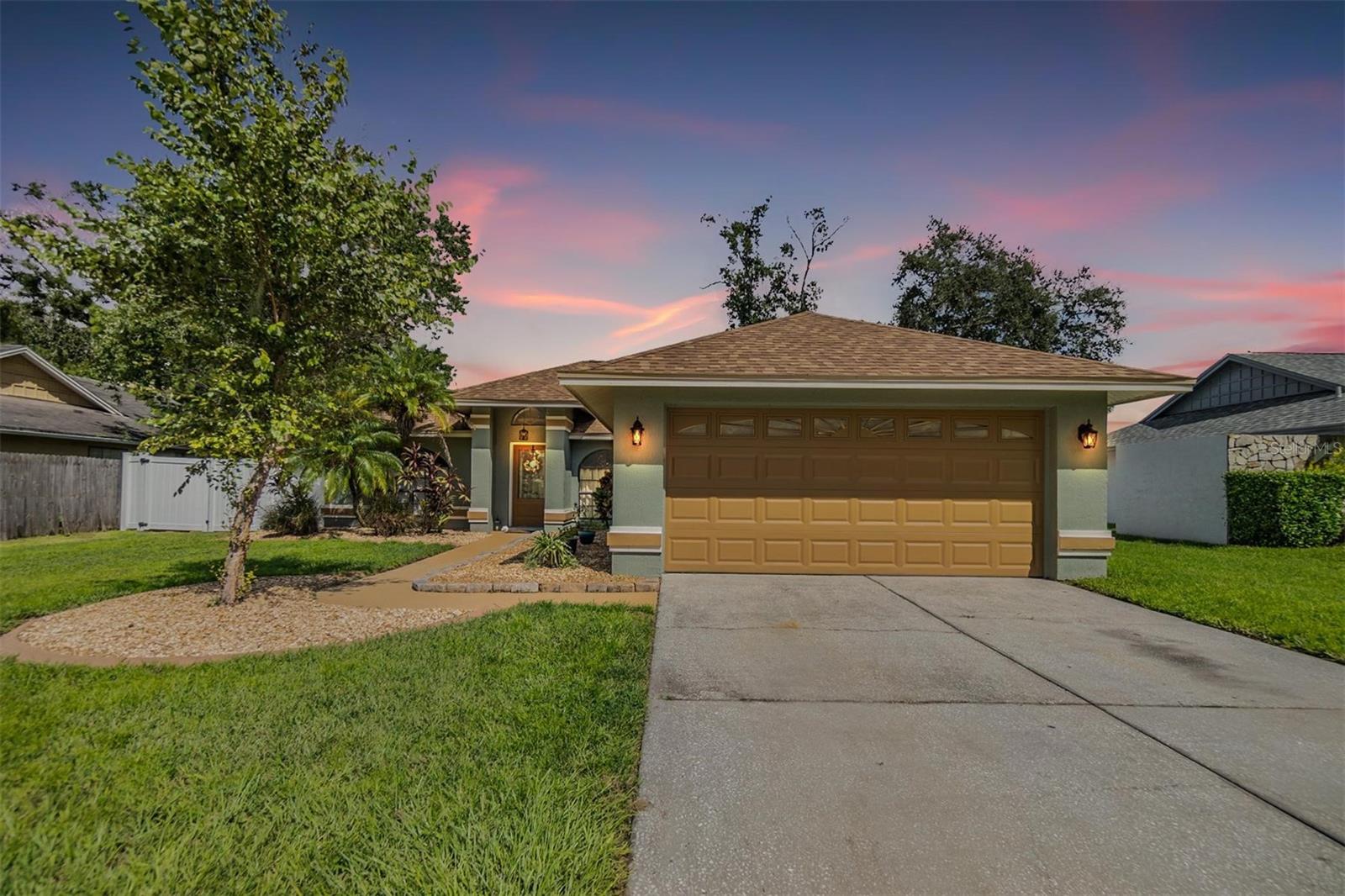 Welcome to 23526 Pine Lake St, a beautifully maintained 3-bedroom, 2-bathroom single-family saltwater POOL (New pump 2024) home in the highly desirable Lake Padgett East community of Land O’ Lakes. Offering 1,690 sq ft of thoughtfully designed living space, this residence blends modern upgrades with everyday comfort.Step into a spacious kitchen featuring stainless steel appliances—including a new refrigerator (2025) and new oven (2023)—granite countertops, and abundant cabinetry. The open layout flows seamlessly into the living and dining areas, while the dining room’s barn door adds flexibility for use as an office or playroom.The primary suite offers a private retreat with an en-suite bath and direct pool access. Additional bedrooms provide generous space for family or guests. The home has been meticulously cared for and features paid-off solar panels (installed 2018, re-installed 2023) averaging $100/month in electricity savings, new roof (2023), new AC (2021), and re-grouted shower Outdoor living shines with a screened saltwater pool, new Zoysia sod (2025), updated shells and mulch (Fall 2025), a fenced backyard with a double gate, and fencing installed in 2021—perfect for storing outdoor toys or creating your ideal space.Residents enjoy access to the Lake Padgett East community center, offering a resort-style pool, tennis and basketball courts, fitness center, playground, neighborhood bar with discounted beverages and more for only $60/month. Ideally located near lakes, parks, dining, shopping, and major roadways, this home is the perfect blend of convenience and tranquility.Move-in ready and beautifully updated—schedule your private showing today!