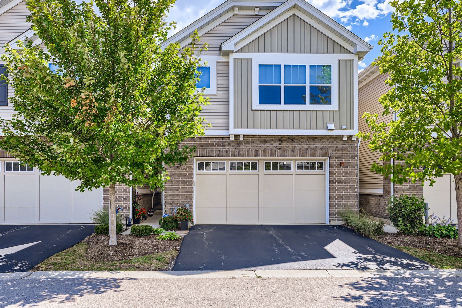 **WELCOME HOME!**FIVE YEAR NEW TOWNHOUSE IN AWESOME NEIGHBORHOOD!*AWARD WINNING SCHOOLS!*GREAT LOCATION IN THE PEACEFUL, DESIRABLE AND FRIENDLY COMMUNITY OF VIBRANT ARLINGTON HEIGHTS!*ENTER AND ENJOY THE STUNNING OPEN FLOOR PLAN WITH SOARING TWO STORY FOYER AND SPECTACULAR STAIRCASE BUILT WITH OAK RAILINGS AND DECORATIVE WROUGHT IRON BALUSTERS*YOU WILL APPRECIATE YOUR FIRST IMPRESSION OF A TRULY GREAT SPACE ALONG WITH THE AMPLE WINDOWS THAT ALLOW WARM, NATURAL SUNLIGHT TO SHOWCASE THE GORGEOUS HARDWOOD FLOORS AND SPACIOUS ARCHITECTURAL DESIGN WHICH BOASTS NINE FOOT FIRST FLOOR CEILINGS*WELCOMING, LIGHT AND BRIGHT OPEN LAYOUT BEGINS WITH YOUR WONDERFUL LIVING ROOM - PERFECT FOR ENTERTAINING AND INCLUDES A MODERN WALL MOUNTED FIREPLACE, RECESSED CAN LIGHTING AND PLANTATION SHUTTERS AND IS WIDE OPEN TO THE DINING AREA WITH SLIDERS THAT LEAD TO YOUR  BEAUTIFUL AND PRIVATE BACKYARD COMPLETE WITH CONCRETE PATIO WHICH IS PERFECT FOR BAR-B-QUES AND EXTENDED OUTDOOR ENTERTAINING*GORGEOUS GOURMET CHEF'S KITCHEN WITH TALL 42-INCH SHAKER STYLE CABINETS, STAINLESS STEEL APPLIANCES, QUARTZ COUNTERTOPS, BRUSHED NICKEL FIXTURES, RECESSED CAN LIGHTING, GLASS TILE BACKSPLASH AND LARGE PENINSULA WITH BREAKFAST BAR AREA, PENDANT LIGHTS AND GLASS TILED HALF WALL*AMAZING AND SPACIOUS MASTER BEDROOM SUITE WITH CATHEDRAL CEILINGS, RECESSED CAN LIGHTS, CEILING FAN AND HUGE 14 FOOT WALK-IN CLOSET*IMPRESSIVE MASTER BATHROOM WITH LAVISH DUAL MARBLE VANITY TOPS, TILE FLOORS AND SHOWER WALLS, LINEN CLOSET AND WALK-IN SHOWER WITH DELUXE DUAL SHOWER SPRAY HEAD*BEAUTIFUL SECOND FLOOR GALLERY HALLWAY*NICE SIZE BEDROOMS WITH RECESSED CAN LIGHTING*HALL BATH WITH ELEGANT MARBLE COUNTERTOPS, TILE FLOORS AND SHOWER WALLS AND LUXURY DUAL SHOWER SPRAY HEAD*CONVENIENT SECOND FLOOR LAUNDRY ROOM WITH TILE FLOORS*GET READY TO INVITE ALL OF YOUR FAMILY, FRIENDS AND NEIGHBORS OVER TO HAVE TONS OF FUN IN YOUR AWESOME FINISHED BASEMENT WITH EXTRA TALL CEILINGS - AN ADDITIONAL SPACE FOR ENTERTAINING AND HOSTING OF MEMORABLE EVENTS - COMPLETE WITH RECESSED CAN LIGHTING AND FULL BATHROOM WHICH INCLUDES QUARTZ COUNTERTOPS, TILE FLOORS AND SHOWER WALLS*PAINTED IN TODAY'S WARM, NEUTRAL COLORS*TWO PANEL WHITE DOORS AND WHITE TRIM*CUSTOM BLINDS THROUGHOUT*GARAGE DOOR WITH WINDOW PANELS TO LET SUNLIGHT IN AND ADDITIONAL CEILING MOUNTED STORAGE RACKS*UTILITY ROOM WITH HIGH EFFICIENCY HOT WATER TANK AND HIGH EFFICIENCY FURNACE*SUMP PUMP WITH BATTERY BACKUP*FIRE SPRINKLER SYSTEM*CLOSE TO SCHOOLS, TRANSPORTATION, HARPER COLLEGE, X-WAYS, PARKS, TRAILS, SHOPPING AND DINING*ONE YEAR HOME WARRANTY INCLUDED*QUICK CLOSING POSSIBLE*TOO MUCH TO LIST!*HURRY BEFORE THIS ONE IS GONE!