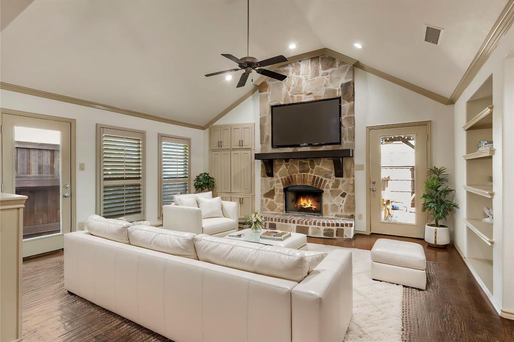 Want custom touches without the custom home price?  As you step into this beautiful W. Allen home, you will see a thoughtful design that combines character & function. The entry greets you with a 20’ ceiling & handscraped hardwood floors which extend thru the majority of the 1st floor. Enjoy an open floor plan which offers a warm & inviting Liv area with Vaulted ceilings & Stone to Ceiling FRPL as well as a furniture niche & not one but two beautiful builtin bookcases. Flexibility abounds on the 1st floor with an oversized Dining & Study. Either can be converted to extra LA's or kids retreat. Either dining area will accommodate a bigger table. Eat in dining features a beautiful built in bench. Primary ste is large enough for a sitting area & has builtins as well as access to a private deck to enjoy your morning coffee. Form & function continues into the Kitchen where you will find painted cabinets, a Warming drawer, pop up appliance stations, bfast bar, gas cooktop & custom spice cabinet as well as roomy corner cabinet + pot & pan drawers. The 2nd floor features 2 Lrg Brs, a medium sized Br & full Bath with builtin hamper. Several pocket doors allow for more usable space. Enjoy year round outdoor living on the oversized deck with pergola + string lights + outdoor FRPL. Additional outdoor features incl: Herb garden + Potting sheds + electric gate on 8' board on board fence. **HOME WARRANTY INCLUDED** Recent Upgrades & Updates Galore incl: Decks & Roof (End of 24), Interior & Ext paint (2025), Carpet (2025), back door & side door (2025), dishwasher (2023), HWH in (2021) all light fixtures have been updated throughout & can lights have been replaced with energy efficient LED lights. Several Smart home features. Low maintenance landscape in back yard and Large park around the corner offer the best of both worlds.  All of this in addition to a location that can get you to 121, 75, The Village or The Hub in under 5 minutes.