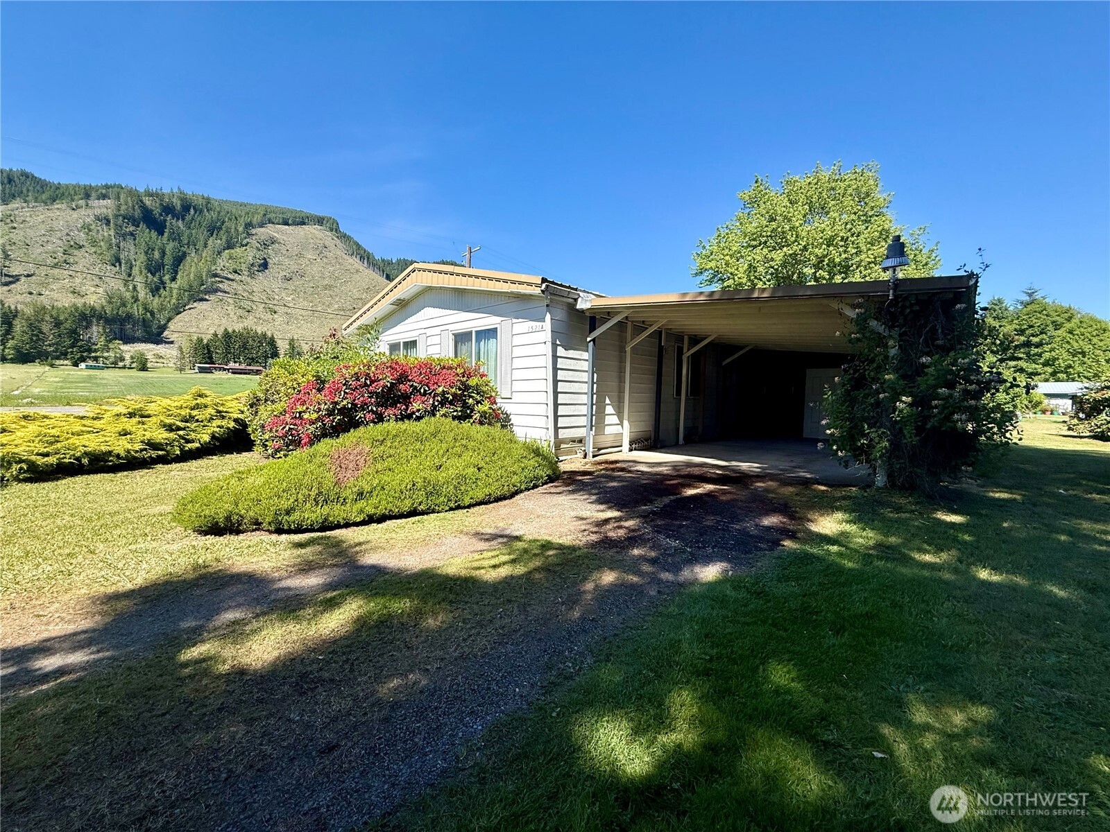 Affordable home sitting on .580 acres with 3 bedrooms and 2 baths with 1,440 square feet of living space. Features a yard that has been beautifully landscaped and well-maintained, covered parking with a detached carport and storage shed. If you're looking for an affordable home in a quiet area but still close to local amenities, set up a showing today!