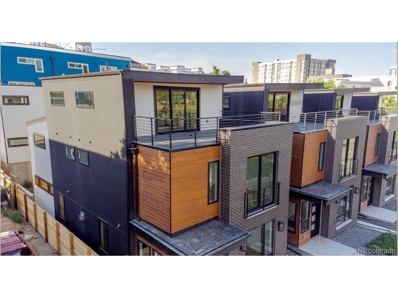 Experience sophisticated design and effortless urban living, an exceptional modern residence in Denver's coveted Jefferson Park neighborhood. Thoughtfully designed with contemporary finishes, expansive living spaces, and remarkable versatility, this property offers an elevated lifestyle just moments from Downtown Denver.Featuring 3 bedrooms, 4 bathrooms, two luxurious primary suites, a dedicated office, and a spacious loft, the main residence seamlessly blends refined aesthetics with everyday functionality. An intelligently designed floor plan creates inviting spaces for entertaining, working, and relaxing.The gourmet kitchen serves as the heart of the home, showcasing sleek quartz countertops, premium appliances, generous cabinetry, and an oversized eat-in island. Both primary suites offer spa-inspired five-piece bathrooms and oversized walk-in closets, creating private retreats designed for comfort and relaxation. The dedicated office and versatile loft provide additional flexibility for a media room, fitness space, or secondary lounge.Embrace Colorado's indoor-outdoor lifestyle with a beautifully maintained patio and impressive rooftop deck featuring captivating Denver skyline views. Perfect for morning coffee, sunset cocktails, or entertaining under the stars, these outdoor spaces extend the home's luxurious living experience.Adding exceptional value is the detached two-car garage with a private one-bedroom accessory dwelling unit (ADU), complete with its own entrance and laundry. Ideal for guests, extended family, a private workspace, or potential rental income, this separate residence offers flexibility rarely found in urban living.Situated in the heart of Jefferson Park, enjoy convenient access to Downtown Denver, LoHi, the Highlands, Empower Field at Mile High, acclaimed dining, boutique shopping, parks, and entertainment. Nearby biking routes and easy access to I-25 make exploring Denver effortless.