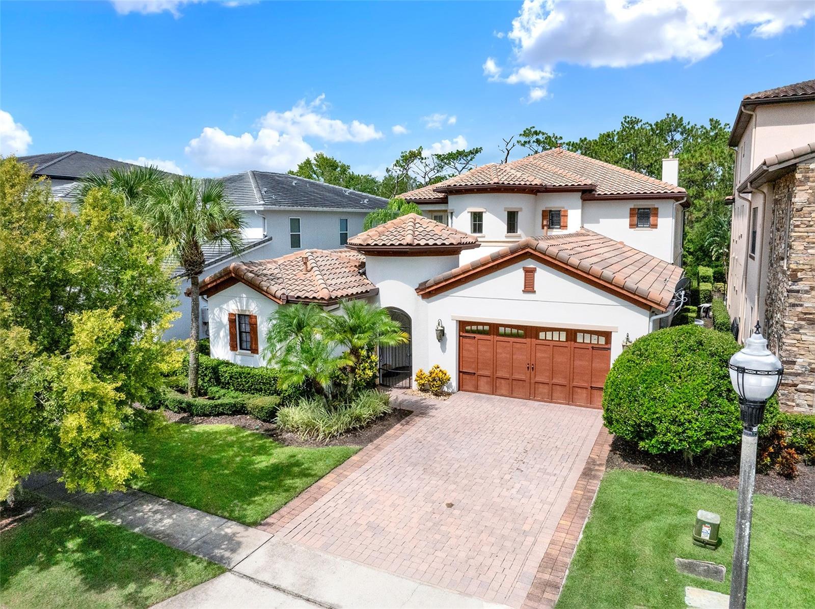 *Reunion Club Membership Available* Live like you’re on vacation—every. single. day. This fully furnished 7-bedroom Mediterranean-style masterpiece in Reunion Resort is minutes from Disney and Central Florida’s best attractions, yet feels like its own private world. Use it as a short-term rental or claim it as your personal castle—you can’t lose. Step outside to your screened-in pool with peaceful conservation views—no theme park crowds here, just you and serenity. Movie night? The converted garage theater has you covered. Guests? The detached casita (a.k.a. mother-in-law suite) means everyone gets their own space and privacy. And when you feel like venturing out, Reunion Resort’s world-class amenities await: an exclusive water park with lazy river and slides, three private golf courses designed by legends, multiple shimmering community pools, on-site dining, a full fitness center, tennis and pickleball courts, and so much more. Mediterranean charm, luxury resort amenities, and an address that makes the Mouse your neighbor—what more could you want?