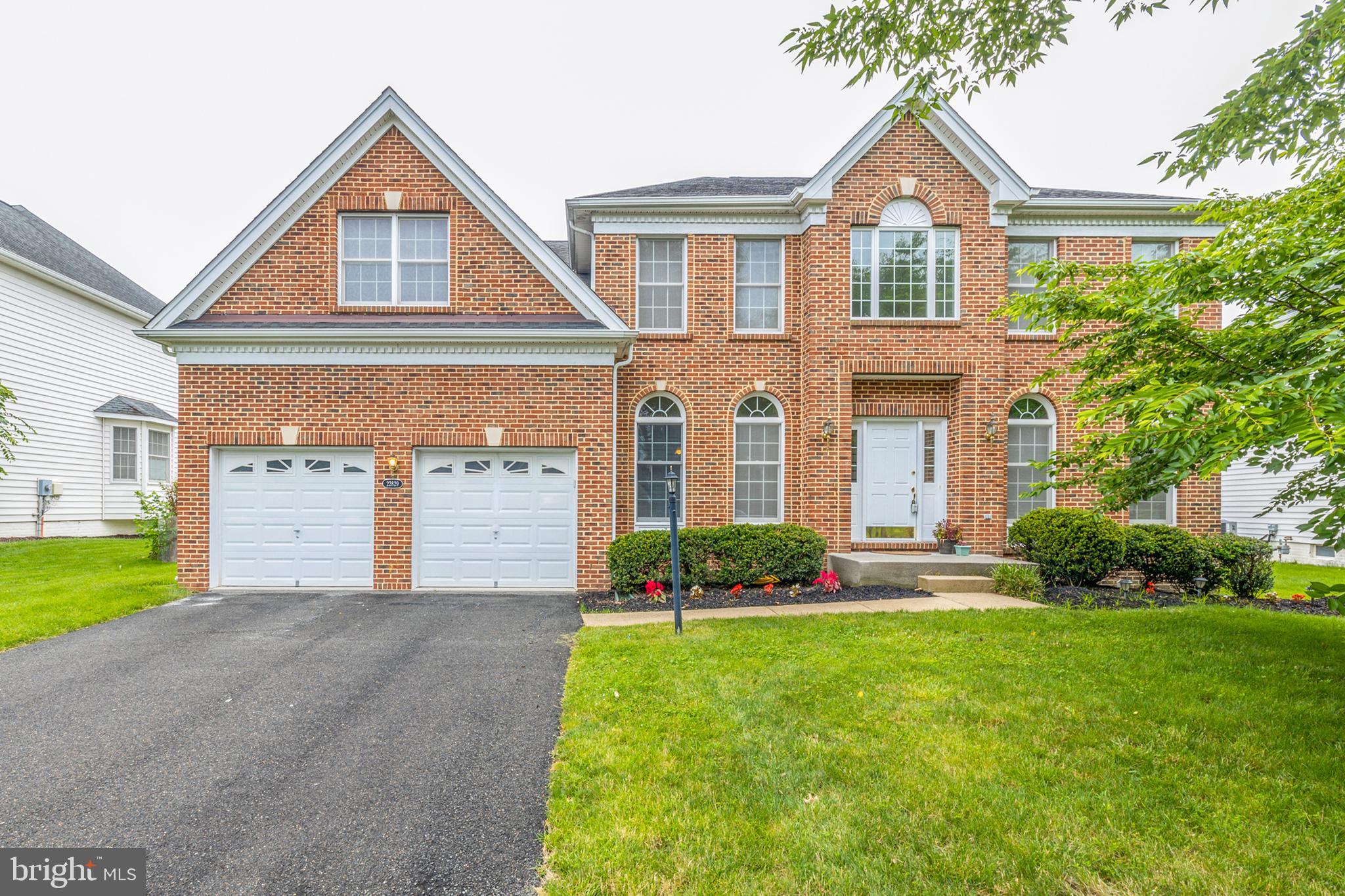 Beautifully updated large Toll Brothers SFH in sought after Loudoun Valley Estates! Move in ready with new flooring throughout and fresh paint. Spacious floorplan has the perfect room sizes! Main level has a 2 story foyer and family room (with gas fireplace), separate living room and dining room, study, half bath, and kitchen with white cabinets, black granite, and access to the 2 car garage and mud room (with access to the rear yard). Upper level has a large owner's bedroom, sitting room, dual walk in closets, and an attached owner's bathroom, 3 additional secondary bedrooms and a hall bathroom. Custom designed lower level has a large rec room, bar/kitchenette, spa like full bath, and den with walkout to rear yard. Maintenance free deck overlooks the huge FLAT backyard! Great location in Ashburn!!