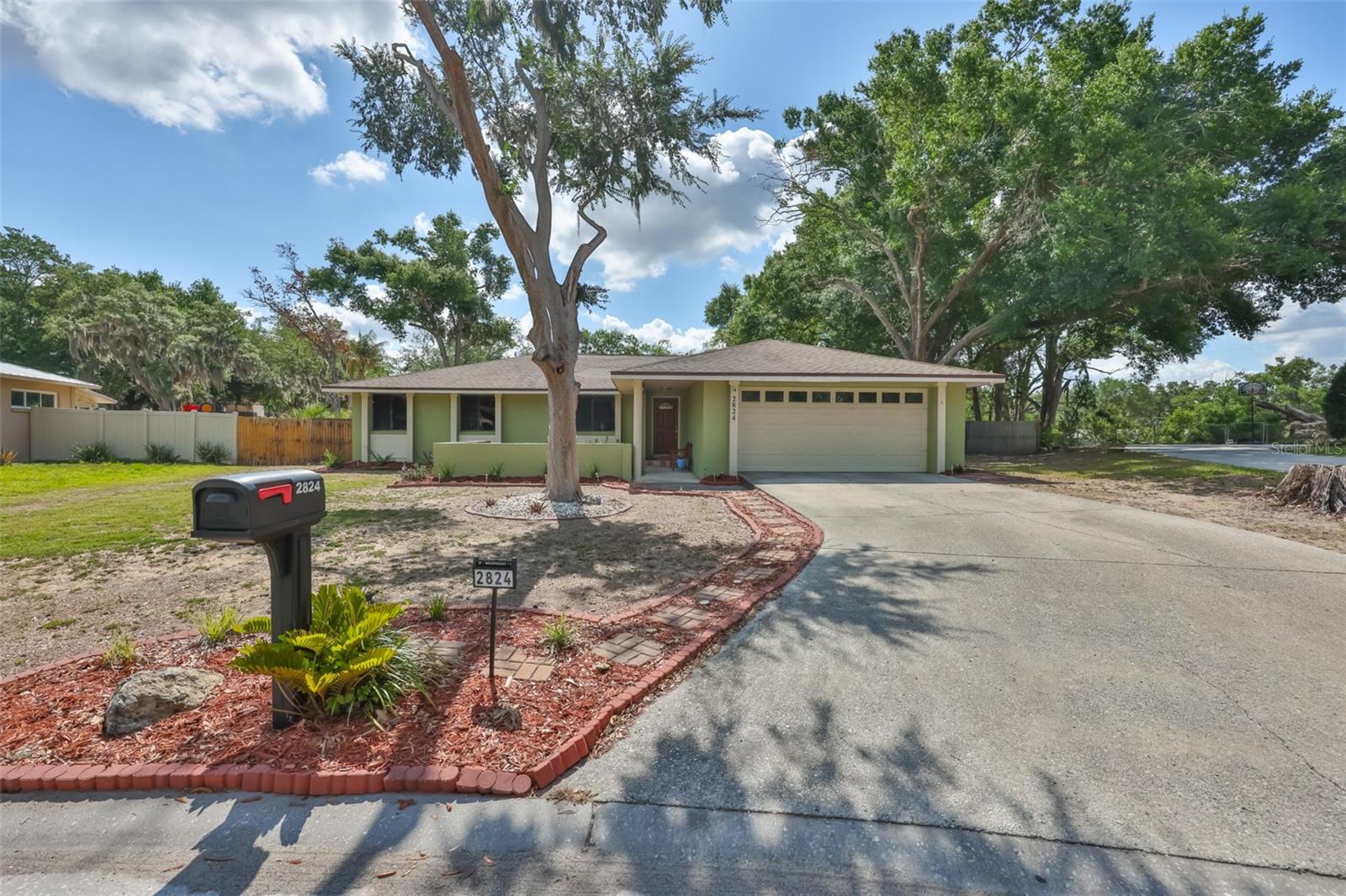 FANTASTIC OPPOURTUNITY COMING YOUR WAY!!  CHECK THIS OUT----------->  WE PRESENT TO YOU THIS WONDERFUL 4 FULL BEDROOMS, 2 FULL BATHROOMS, JUST UNDER 1800SQFT, ***HUGE LOT .36 ACRE*** NO HOA, NO CDD (SO BRING YOUR BOATS OR RV) AND IT'S READY FOR NEW OWNERS!!  ARRIVING at YOUR NEW HOME, notice the LONG EXTENDED DRIVEWAY, OVERSIZED 2 CAR GARAGE, NEUTRAL COLOR PALETTE OUTSIDE, CLEAN ROOF, FRESH MULCH and FLOWERS, FANTASTIC SITTING AREA WITH COVERED FRONT PORCH where you can SIT, SIP ON YOUR FAVORITE BEVERAGE and ENJOY THE FRESH AIR!!  STEP INSIDE to YOUR LOVELY HOME INCLUDING A TILED ENTRYWAY and enjoy the FLOORPLAN FEATURING A LIVING AREA, A GREAT ROOM AREA with WETBAR, SEPARATE DINING AREA with RECESSED LIGHTING and a BUILT-IN NOOK for SHOWCASING SPECIAL PIECES/CHINA, SUNKEN ROOMS (SO WATCH YOUR STEP), KITCHEN FEATURES NEW DISHWASHER and RANGE, UPDATED STAINLESS STEEL FRIDGE, DUAL STAINLESS STEEL SINK, TILED FLOORS and SMALL EAT-IN SPACE IF DESIRED!!  THE PRIMARY SUITE IS SPACIOUS, FEATURES DUAL CLOSETS, CEILING FAN, RECESSED LIGHTING, PLENTY OF NATURAL LIGHT from the windows and our PRIMARY BATH has UPDATED VANITY, TOILET, LIGHTING and HAS A WALK-IN SHOWER!!  GUEST BEDROOMS ARE SPACIOUS and FEATURES DUAL CLOSETS, CEILING FANS, our 4TH BEDROOM/OFFICE HAS DUAL CLOSETS AS WELL!!  YOUR GUEST BATHROOM ALSO INCLUDES UPDATED VANITY, TOILET, LIGHTING, CABINET, MIRROR and FEATURES A SHOWER WITH TUB for SCUBBY DUBBY TIME!!  LET'S STEP OUTSIDE!!  OPEN THE SLIDERS TO YOUR HUGE SCREENED-IN LANAI, the MASSIVE OVERSIZED BACKYARK will allow MANY ENJOYMENTS INCLUDING BOAT/RV PARKING, PERHAPS THAT NEW SHED/WORKSHOP AREA YOU'VE BEEN WANTING, MOSTLY WOOD PRIVACY FENCING, (some chain link in the back area), LIVE OFF THE LAND & ENJOY YOUR OWN FRUIT FROM YOUR TREES (PLENTY OF SPACE TO ADD YOUR OWN VEGETABLE GARDEN), PLENTY OF SHADE FROM SURROUNDING TREES, PERHAPS A FIREPIT AREA as there is a CONCRETE PAD ALREADY THERE!!  THIS HOME COMES WITH A BRAND SPANKING NEW AC UNIT WITH 10 YEAR TRANSFERABLE WARRANTY AND NEWER DUCTWORK IN ATTIC IN 2024,  I KNEW IT...YOU ARE ALREADY IN LOVE!!  HOME HAS PUBLIC WATER AND PRIVATE SEPTIC TANK with NEW DRAINFIELD IN 2024, THE LOCATION IS FANTASTIC, COUNTRY FEEL BUT IN THE HEART OF BRANDON, CLOSE TO SCHOOLS, SHOPPING, RESTAURANTS, 75, I-4, 301, HWY 60, TOLL AND we already mentioned NO HOA or CDD!!  COME SEE THIS HOUSE TODAY CAUSE YOU KNOW WHAT WE SAY...If you SLEEP ON IT, you may not SLEEP IN IT!!