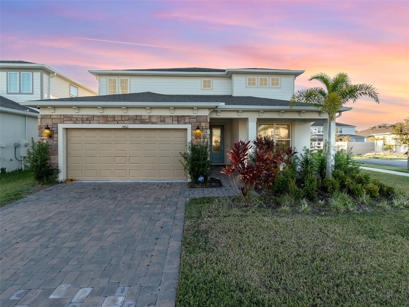 MOTIVATED SELLER!!! Location! Location! Location! Discover this stunning Orlando home for sale at 1462 Grand Palm Drive, perfectly situated on a premium corner lot with over $50,000 in builder upgrades. From the elegant iron rod staircase to the rock-accent front exterior, every detail has been thoughtfully designed for style, comfort, and lasting quality. This move-in ready home features a built-in wire system for TV and smart home additions, a paid-off security system with $5,000 value, and a convenient Chameleon central vacuum system. The open floor plan and upgraded finishes create a bright and modern living space — perfect for families and entertaining. Step outside to your very own outdoor patio kitchen, ideal for weekend BBQs and relaxing Florida evenings. Enjoy the privacy of a corner lot with beautifully maintained landscaping and plenty of room to unwind. Located near top-rated schools, shopping, dining, and major highways, this home combines modern comfort and energy efficiency with convenience and luxury. Motivated Seller! With its outdoor kitchen, premium upgrades, and prime Orlando location, this home offers unbeatable value and lifestyle. Don’t miss your opportunity to own one of the best homes in this desirable community!