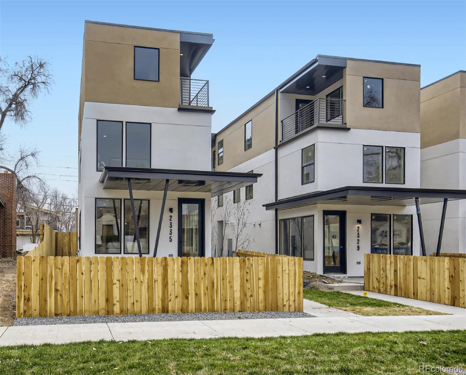 Brand new, 3-story contemporary half duplex just a short walk from restaurants, shops, parks, and Denver University. The spacious and open-concept floor plan includes high-end finishes throughout. The first floor encompasses an open-plan, eat-in kitchen, plus living and dining room space perfect for entertaining. Guests will love the private basement quarters, complete with a bedroom, full bath, living area, and kitchenette. This could also act as a rentable mother-in-law suite with semi-private entry.
Move to the second level to find a spacious master suite with a walk-in closet, master bath with double vanity, separate toilet room, and spa-style shower. The laundry is conveniently located right around the corner.  
Take in the view as you ascend to the third floor into a spacious bonus room with a wet bar and covered balcony. The third floor also includes a third bedroom and full bath.
One car garage with ample height for extra storage and 1 permitted street parking space ensures parking will not be an issue. Don’t miss this rare new build in an unbeatable area.

more info at: www.HighStreetFlats.com