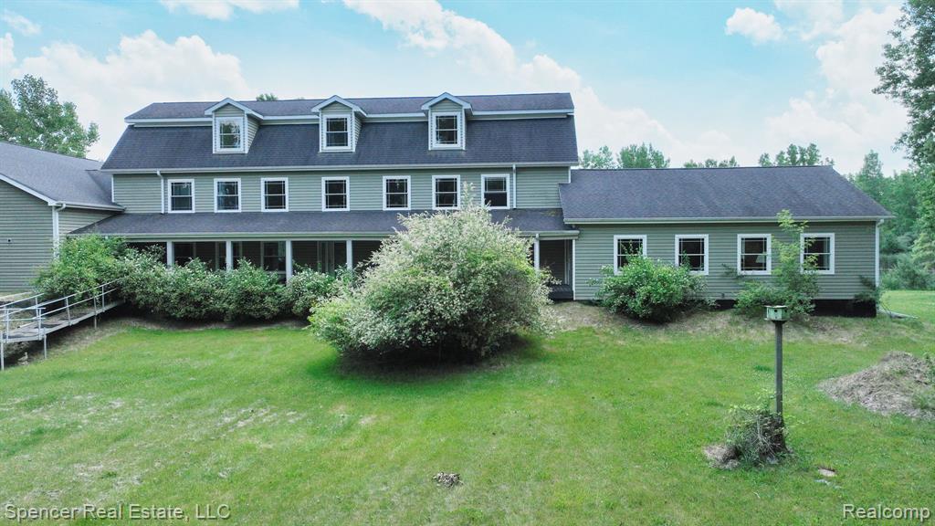 Approximately 6,100 sq. ft. home on 10 acres in Armada. Includes 5 bedrooms, 3.5 bathrooms, and three finished levels. Third floor may be used as additional living space.
Main level includes open-concept kitchen, dining, and living area with access to rear deck. Primary bedroom located on the main floor with separate entrance, laundry area, and storage.
Additional features:
Two laundry areas (main and upper levels)
Built-in storage throughout
Large garage
Pond on property
Zoned agricultural
Additional 50 acres available separately (See MLS# 20251013411)
All measurements and data are approximate. Buyer and buyer's agent to verify all information.