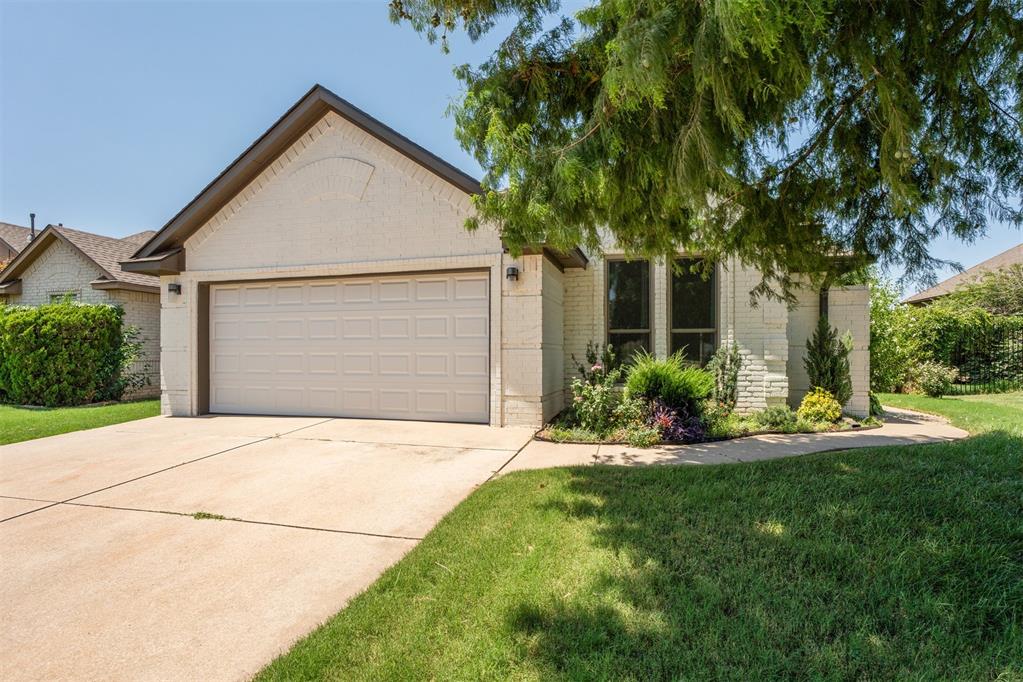 Don’t miss the opportunity to own this home in a highly desirable neighborhood on a greenbelt lot. Enjoy peace of mind with a newer roof featuring Class 4 impact-resistant shingles, newer A/C, updated exterior paint, and newer windows throughout most of the home. Step inside to find a welcoming living room with a charming two-sided fireplace that also warms a cozy study or home office with french doors. The spacious primary suite is a true retreat with double vanities, a whirlpool tub, and a large walk-in closet. Relax or entertain under the pergola in the beautiful backyard that backs to a serene greenbelt with walking trails—no rear neighbors! Additional features include a storm shelter in the garage for peace of mind and safety. Conveniently located close to schools, shopping, restaurants and the Kilpatrick Turnpike.