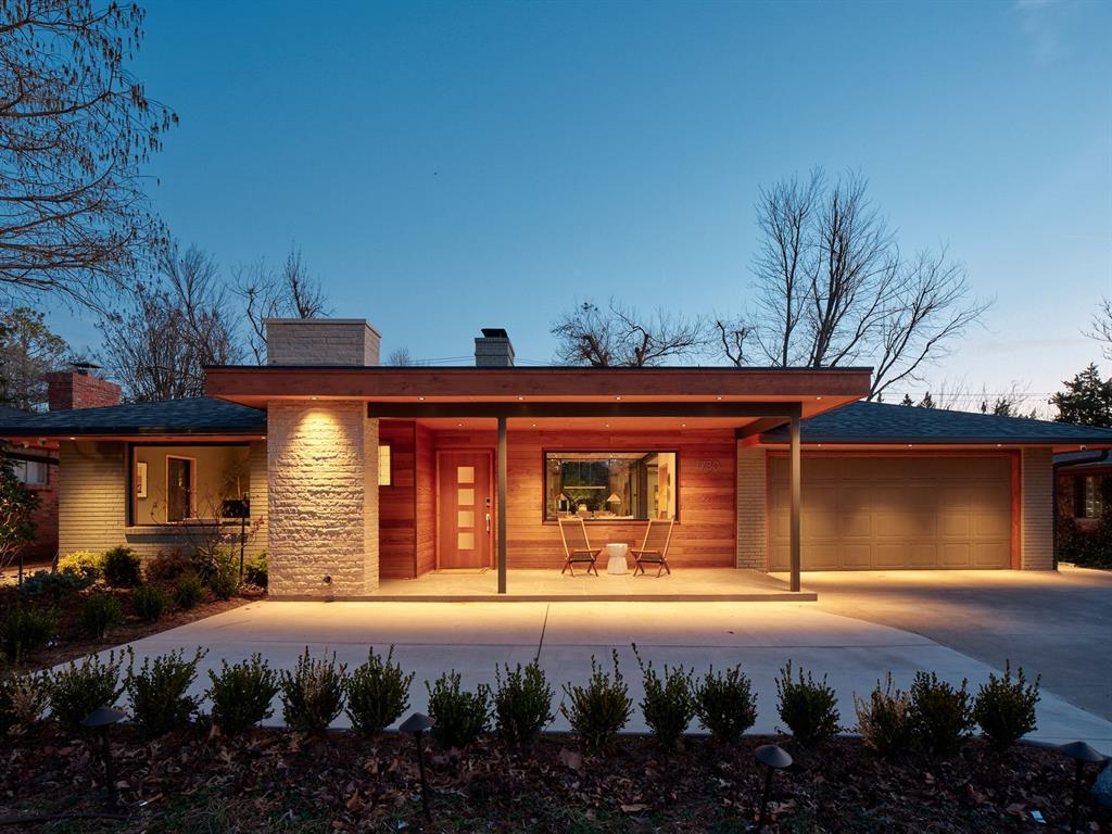 Stunning, fully renovated single-level mid-century ranch in Nichols Hills. This home has been extensively renovated and expanded to live like new construction, blending clean modern lines with today’s most desirable amenities. Offering 3 bedrooms and 2 baths, the home includes a two-car garage, expansive front porch, and spacious covered outdoor living. Custom white oak cabinetry and woodwork are showcased throughout, highlighting exceptional craftsmanship and thoughtful design. The great room features floor-to-ceiling windows, custom built-ins, wood burning fireplace, and a full wet bar, ideal for entertaining or everyday living. Western Window Systems sliding doors fully open from the kitchen and dining areas to a tranquil zen-inspired courtyard garden, creating a dramatic indoor-outdoor focal point. The chef’s kitchen offers natural stone countertops, custom cabinetry, premium appliances, skylights, and a large walk-in pantry. A well-appointed laundry and mudroom connect conveniently to the garage. The private primary suite provides backyard access and a spa-inspired bath with heated marble floors extending into the oversized shower, soaking tub, heated towel rack, dual vanities, and custom walk-in closet with integrated lighting. Additional features include wide hallways, abundant storage, luxury finishes, additional parking, smart lighting/security/sound systems, and full security with cameras. A rare opportunity to own a fully renovated, design-forward home in one of Oklahoma City’s most sought-after neighborhoods.