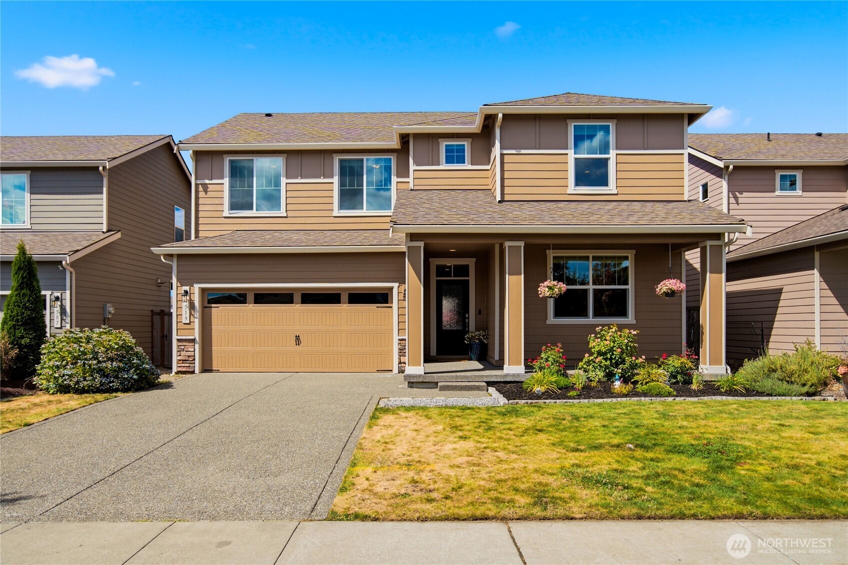 Space, style, and VALUE at this 5-bedroom home in Enumclaw. At 2,660 sq ft, the floor plan offers space for everyone with a main-level bedroom and full bath—perfect for guests, multigenerational living, or a private home office. The upper level holds the primary suite, including a 5-piece bath, three additional bedrooms, and a versatile bonus room. The main-level great room is the heart of the home, anchored by a cozy gas fireplace and open to the kitchen's eating space, ideal for everyday living and easy entertaining. Freshly updated with brand new carpet and interior/exterior paint, this home is truly move-in ready. Central A/C, an on-demand water heater, and wiring for a generator round out the practical upgrades. Walk-in closets and a walk-in pantry add everyday convenience, while durable LVP flooring keeps cleaning simple. Outside, a level, low-maintenance lot is just steps away from Martin Holdener Park, which offers a playground, covered gathering area, and green space to enjoy. You will love the neighborly vibe in SunTop with winding sidewalk paths and gorgeous mountain views. Add in quick access to Mt. Peak's hiking trails and Hwy 410 for year-round outdoor adventures—from skiing at Crystal Mountain to hiking at Mt. Rainier—and this home puts the best of the PNW right at your doorstep.