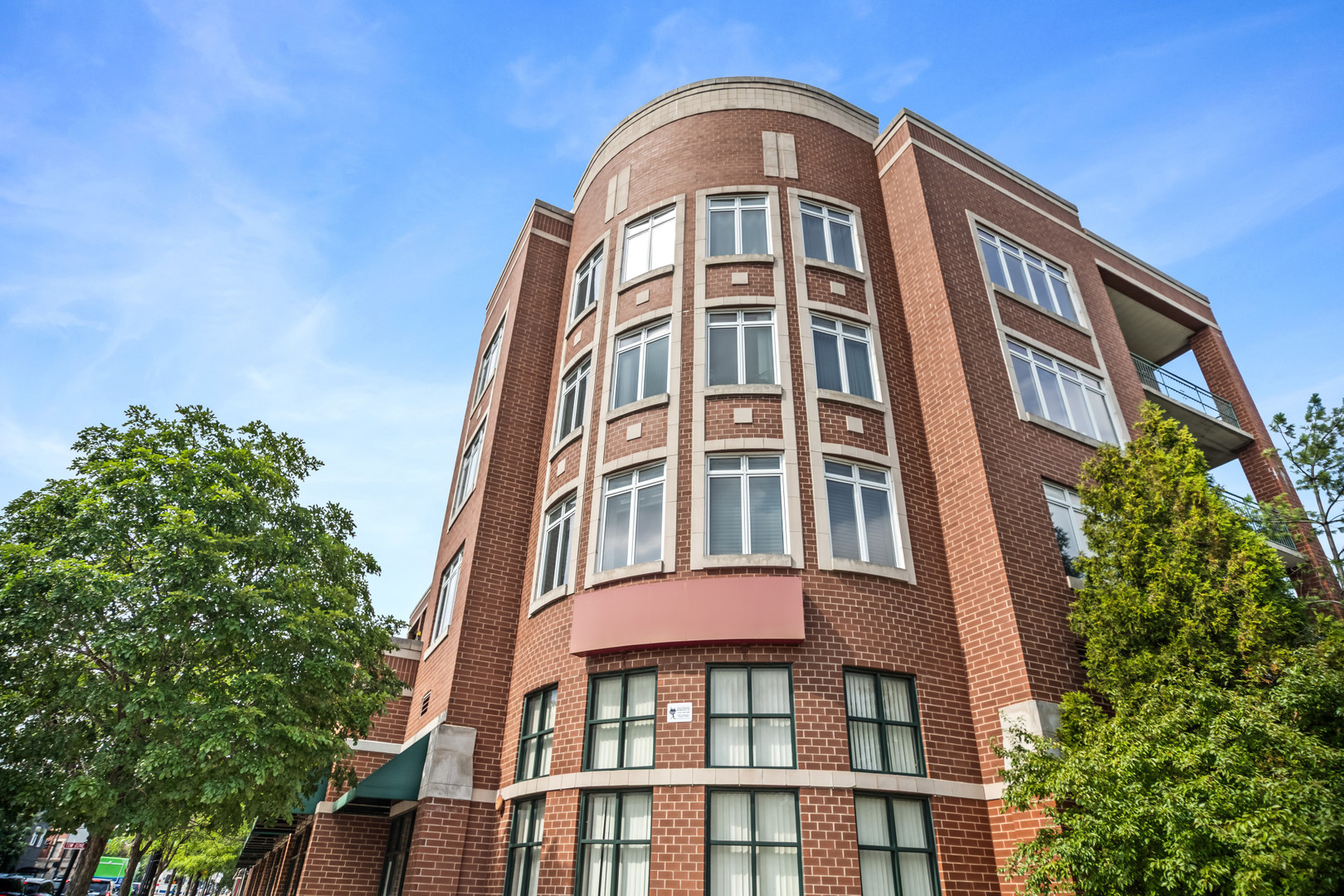 Rarely available, light filled end unit in a boutique elevator building. This 2beds 2baths condo is one of a kind! Features include 1700 sqft of living space, hardwood floors, concrete/soundproof ceilings, excellent storage including a utility closet with side by side laundry, large primary suite with two large closets, en-suite boasts deep soaking tub, dual sinks and separate shower. Spacious kitchen featuring a generous peninsula with a beautiful skylight overhead that floods the space with sunlight. Private balcony with great views and an incredible living and dining room with elegant fireplace. Enjoy sunset views 365 days of the year. Move right in, this home has been meticulously maintained by long term owners. One heated garage parking space and additional storage included. Easy street and permit parking for guests. Wonderful association that covers heat, cooking gas, and hot water, just pay a small electric bill. Excellent location close to Portage Park, Mayfair metra, Montrose blue line, 90/94, Jefferson Park transit station, six corners and more. Don't miss out!