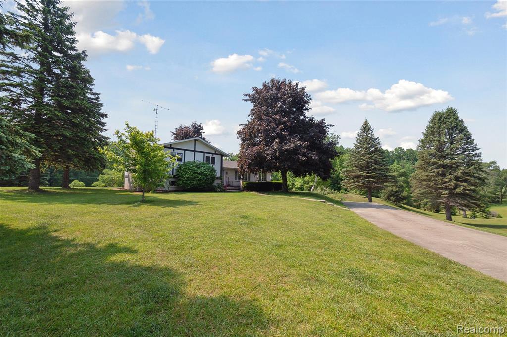 Welcome to the Rolling Hills of Verona, close to Bad Axe! This beautifully maintained and updated 3 bedroom, 2 bath home is waiting for you! Open spaces, welcoming views, and an absolute ton of natural light all make this your ideal next home. Nestled on just over 10 acres of private, wooded beauty, this home invites you in with an open kitchen (with tons of storage!!), spacious bedrooms with roomy closets, two different points of access to the backyard via sliding or double doors, and a lower level family room (new flooring in 2020) with a beautiful brick surrounded fireplace. There have been many updates to the home, with a new roof in 2017, new furnace and A/C in 2019, new water heater in 2024, water softener in 2020, and the downstairs bath redone in 2023. Property butts up against 6,600 acres of state land and is only a half mile from Verona Hills Golf Course!! 
The 40x80 pole barn is a masterpiece, with 14' side walls, (2) 12'x12' entry doors, a side entry garage door (9'x7'), a bathroom, 50/100 shooting range, and a full fledged 20x40 man cave, perfect for your downtime or entertaining. You've got to see this one in person, schedule your private showing today!