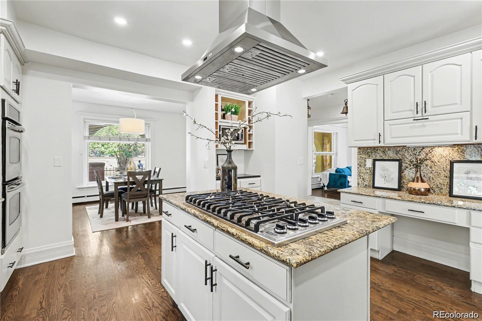 Nestled in one of Denver’s most sought-after historic districts, this beautiful home is full of charm, comfort, and timeless character. From the moment you arrive, the inviting front porch welcomes you in — the perfect place for morning coffee, evening conversations, and quiet moments at the end of the day. Inside, rich hardwood floors, generous living spaces, and a large kitchen with granite countertops create a home that feels both elegant and effortless. Upstairs, the spacious primary suite offers a peaceful retreat, complete with its own private balcony — an ideal spot to unwind and take in the neighborhood’s beauty. A second balcony on the main floor adds even more space to relax or entertain. The finished basement expands the home’s warmth and versatility with an additional living room and a wine cellar, creating the perfect setting for quiet movie nights in or hosting family and friends. An attached 2-car garage and heated driveway bring added convenience year-round. Just steps from local restaurants, charming shops, Cheesman Park, and the Denver Botanic Gardens, this home offers not only an exceptional place to live, but a lifestyle to truly love. Seller willing to provide concession for upgrades!!