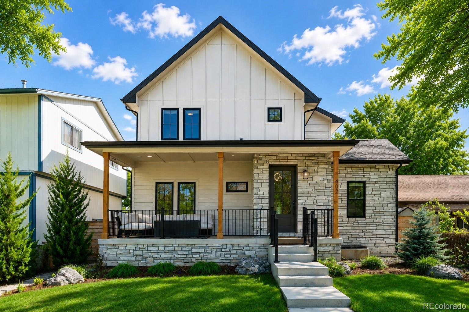 Nestled on a charming, tree lined street only two blocks to the heart of Lafayette’s Old Town District, this newly constructed residence harmoniously marries modern design with the timeless character of its surroundings. Boasting the perfect blend of classic architectural elements and contemporary amenities, this is more than a home: it’s a testament to the artful fusion of eras. The nostalgic front porch with accents of wood, stone and steel provides a welcoming atmosphere for friendly neighbors. Step inside to discover an unobstructed, free flowing layout with an expanse of windows flawlessly designed to adapt as your lifestyle evolves offering strategically placed bedrooms and versatile common areas on every level. Culinary artistry melds with modern innovation in the chef’s kitchen with timeless white cabinets, luminous polished counters, brick set subway tile and an expansive quartz waterfall island. Exclusive Italian Bertazzoni stainless appliances provide an unparalleled cooking experience for the connoisseur of luxury living. A sleek fireplace centers the generous family room where connecting glass doors invite the beauty of the surrounding landscape to become an integral part of the living experience. With its lofted ceilings, the primary suite exudes an uplifting ambiance accentuated by an array of windows. The primary bath offers a captivating interplay of rich wood, pristine quartz, and textured tiles, showcasing a free form tub and Euro shower. Whether it's a cozy movie or lively game night, the finished basement is a multifaceted haven tailored for your enjoyment complete with a welcoming bedroom and bath. The inclusion of an ADU presents an exceptional opportunity for homeowners looking to capitalize on built-in income or those seeking versatile accommodations for family or office space. Experience living in a vibrant neighborhood that exudes a genuine hometown vibe with indie boutiques, renowned restaurants, and open-air concerts and festivals.