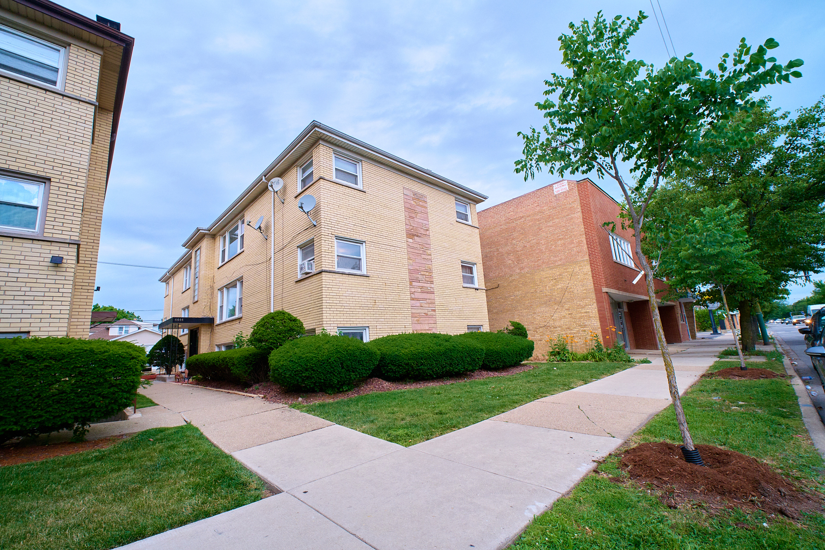 This top-floor 2-bedroom, 1-bath condo offers a clean, spacious layout with great natural light and everything you need for comfortable, low-maintenance living, whether you're moving in or renting out.  The bright and airy living room features large windows and hardwood floors, flowing into a well-designed eat-in kitchen with generous counter space, matching appliances, and plenty of storage. The layout is practical and functional, with two generously sized bedrooms, a full bath with neutral finishes, and great storage throughout. Located in a quiet, well-kept building, the unit includes shared laundry, plus an assigned parking space in the back. This unit is a great option for homeowners who value space, sunlight, and simplicity, or investors seeking solid long-term returns. NO rental cap means you have full flexibility from day one!