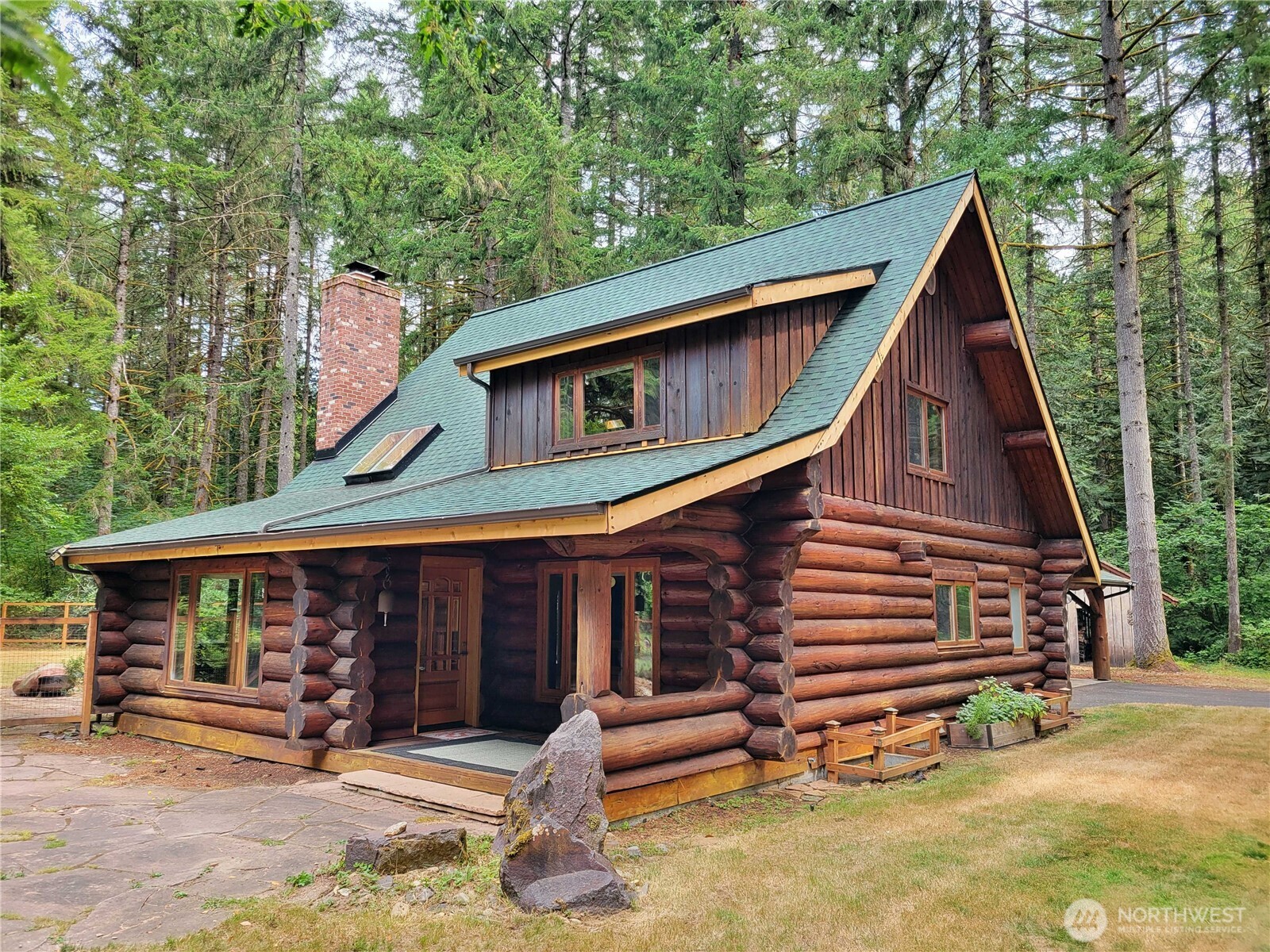 Experience the best of Southwest Washington country living on nearly 20 acres in the Toledo area.   This custom-built log home blends rustic Northwest character with modern comfort, featuring authentic log craftsmanship, vaulted ceilings, exposed beams, expansive windows, and beautiful rural views. The open-concept design offers a warm and inviting setting for entertaining or relaxing by the fireplace.  The spacious property includes a barn and large shop, providing excellent room for equipment, vehicles, hobbies, projects, or storage. A whole-house generator provides dependable backup power, while a NEW $60,000 ROOF adds valuable peace of mind.  With nearly 20 acres of Seclusion, there is plenty of room for animals, gardening, recreation, or simply enjoying the privacy and tranquility of your own country retreat.   Conveniently located near downtown Toledo and I-5, with easy access to Centralia, Chehalis, Olympia, Longview, and Vancouver.  Enjoy nearby Cowlitz River recreation, fishing, hiking, and Mount St. Helens adventures.   Whether you're looking for a full-time residence, hobby farm, retreat, or legacy property, this exceptional custom log home offers the space, privacy, outbuildings, and Pacific Northwest charm you've been looking for.  This Truly is a "Must See" Property!