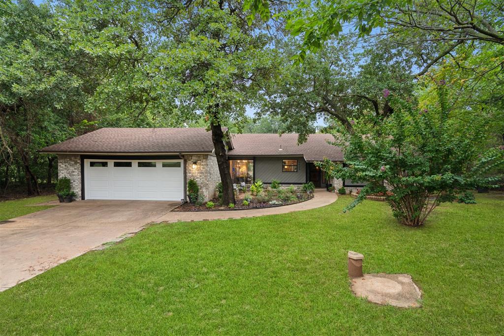 Nestled on a quiet, tree-lined street, 9404 Red Oak Lane offers the perfect blend of classic charm and contemporary comfort. This beautifully updated traditional-style home is the ideal retreat for those seeking seclusion without sacrificing modern convenience. Step inside to find a thoughtfully refreshed interior featuring a brand-new electrical system for worry-free living. The home retains its timeless appeal with warm architectural details, while tasteful modern touches elevate the space—from updated fixtures to fresh finishes that enhance every room. Outside, enjoy peaceful privacy and natural surroundings, complemented by a brand-new garage door that adds both style and function to the home’s inviting exterior.