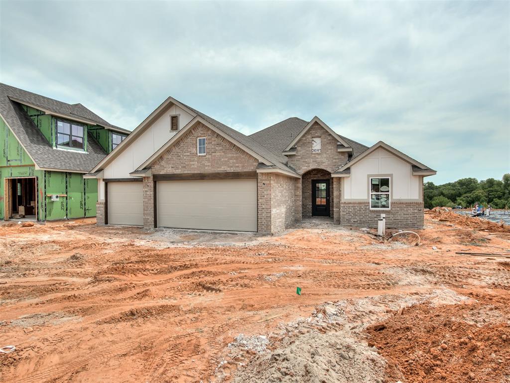 Ask about our incentives! Welcome to this beautiful new construction spec home by The Builder's Collective, located in the desirable community of The Preserve in Edmond, OK. This thoughtfully designed traditional layout offers a spacious living space, featuring three bedrooms, two bathrooms, and a dedicated study. The heart of the home boasts a grand living room with a vaulted ceiling and an electric fireplace, perfectly positioned alongside an open kitchen, dining area, and a functional mud bench & a 3 car garage. Schedule your private tour today!