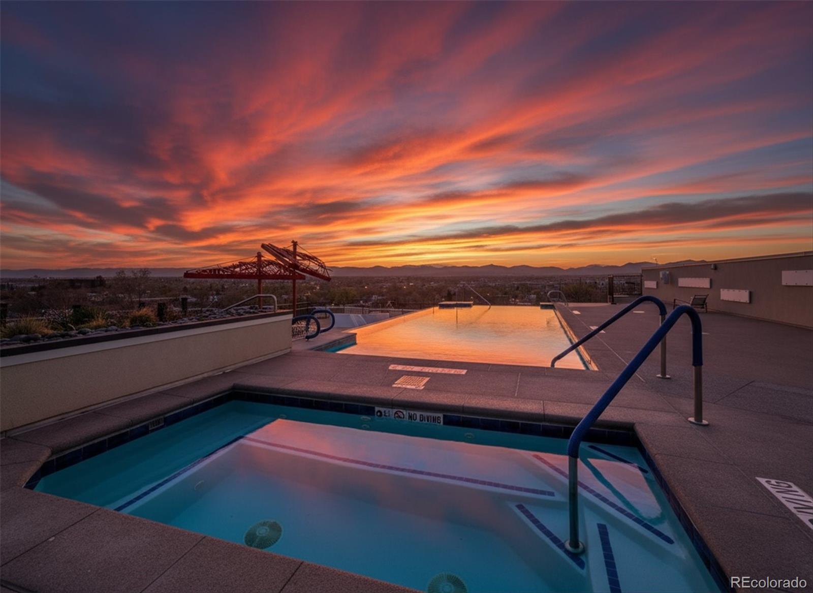 Live the lifestyle you’ve been manifesting in this sleek, move-in-ready 2-bedroom, 2-bath condo offering 1,400 sq. ft. of open living space and 2 secure indoor deeded garage spaces (no more hunting for parking!). Step inside to soaring ceilings, oversized windows, and a bright, open-concept layout designed for both entertaining and everyday living. The modern kitchen features stainless steel appliances, granite countertops, and a breakfast island—perfect for cooking nights in or hosting friends. The spacious primary suite is your private retreat with a spa-like bath, dual vanities, and a generous walk-in closet. A second bedroom and full bath give you flexibility for a roommate, guest space, or work-from-home setup. Enjoy resort-style amenities infinity pool, fitness center, rooftop lounge, concierge, and secure building access. With high-speed internet options, streaming-ready wiring, and smart-home potential, this condo keeps you connected and stress-free. HOA includes utilities, not phone. Located just minutes from trendy coffee shops, local breweries, boutique gyms, and public transit, this home puts the best of Denver at your doorstep. Highlights for today’s lifestyle: 2 indoor garage spaces (rare!), Pet-friendly community, Modern finishes + low-maintenance living, Walk able, social, and connected neighborhood. This is more than a condo—it’s your hub for convenience, community, and elevated living.