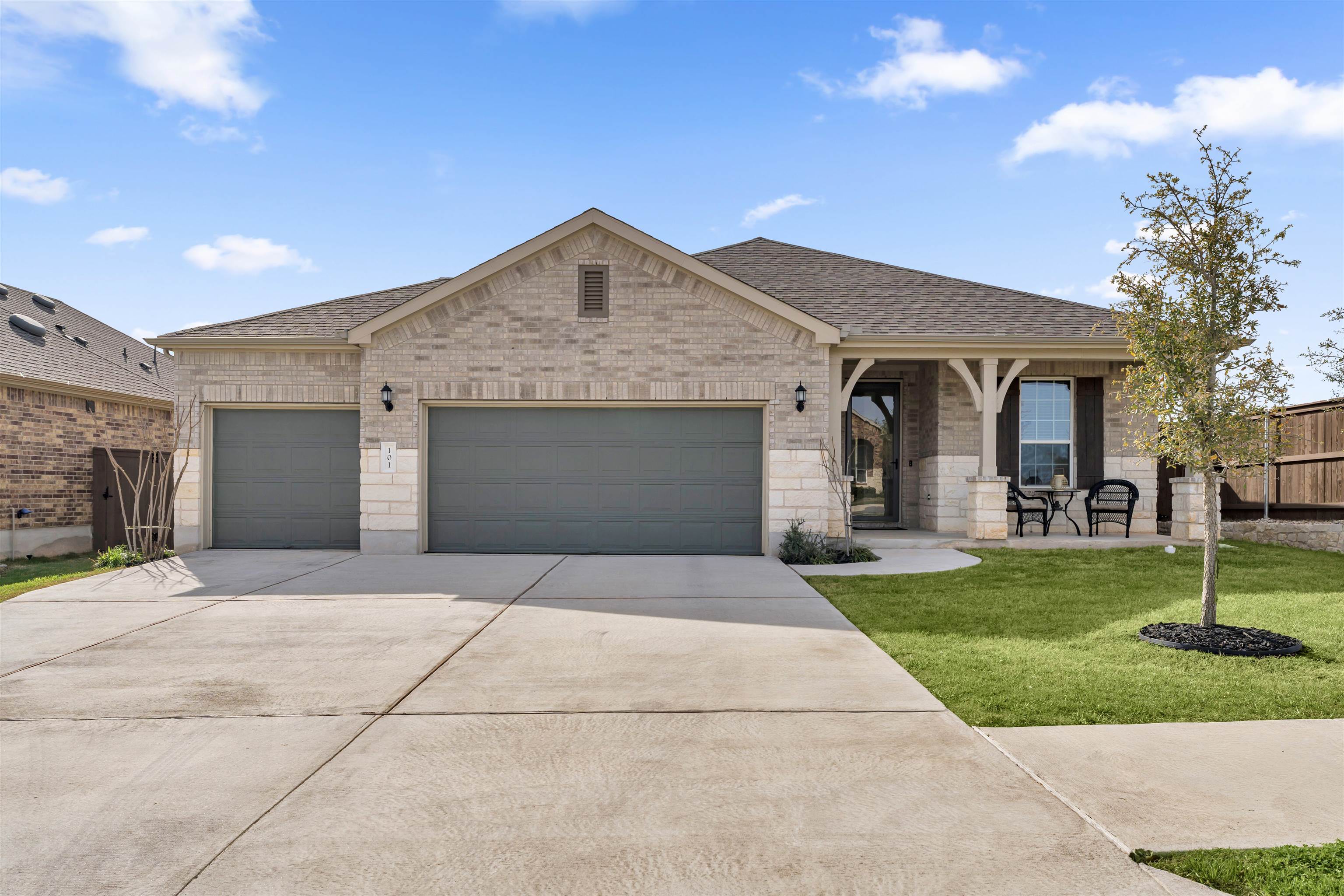 GREGG RANCH -  Hill Country Resort Style Living! Welcome to 101 Jasmine Lane where you can enjoy relaxed Hill Country amenities including resort-style pool, tree lined parks, playscapes, sport courts & walking trails.  This beautifully upgraded Pulte home with oversized 3-car garage built in 2023 is located on a desirable corner lot abutting the grand entry park. Offering 2,046 sq feet of thoughtfully designed living space, this modern 3/2 home blends comfort, style, and functionality. The heart of the home is the spacious kitchen featuring a huge island with custom cabinets perfect for entertaining or casual dining. The open layout flows effortlessly into the living & dining areas, creating a welcoming space for everyday living. The large owners suite offers a peaceful retreat with a large bathroom & an enormous master walk-in closet, while the 3-car garage with durable epoxy flooring provides both convenience & extra room for storage, hobbies, or recreational gear. Living in Gregg Ranch means enjoying these incredible amenities all designed to enhance an active and social lifestyle. Marble Falls places the best of the Hill Country at your door step. The area boasts 9 wineries, 12 golf courses, hundreds of scenic hiking trails, & the nearby Highland Lakes, including Lake LBJ, known for its constant water levels ideal for boating, fishing, skiing, and nearly every water sport imaginable. This home offers not just a place to live, but a gateway to the relaxed & adventure--filled Hill Country lifestyle.
