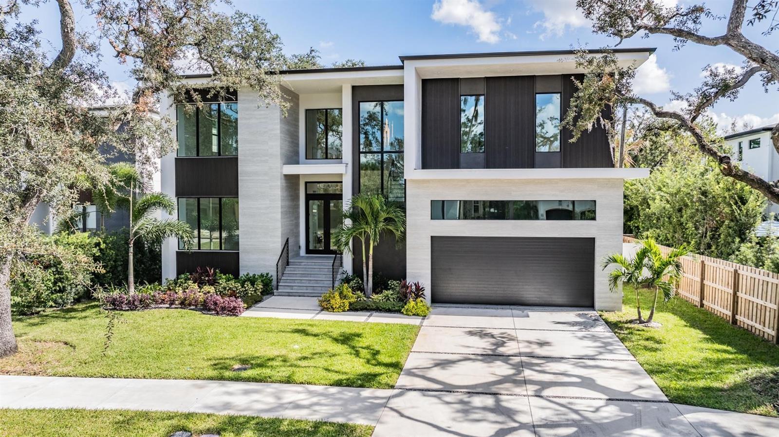 Welcome to this expansive residence located at 214 S Renellie Dr in Tampa, FL. This stunning house accords a generous living area of 4724 square feet, providing ample space for various lifestyle needs. With five bedrooms, each complemented by its own full bathroom, and an additional half bathroom, this home ensures comfort and privacy for everyone. Situated on a sizable 9100 square foot lot, the property presents opportunities for outdoor activities and landscaping creativity. The interior layout is designed to accommodate both relaxation and entertainment, making it a wonderful space for gatherings. Whether you're preparing meals in the spacious kitchen or unwinding in one of the well-appointed rooms, this home promises a harmonious living experience with a beautiful curb appeal.