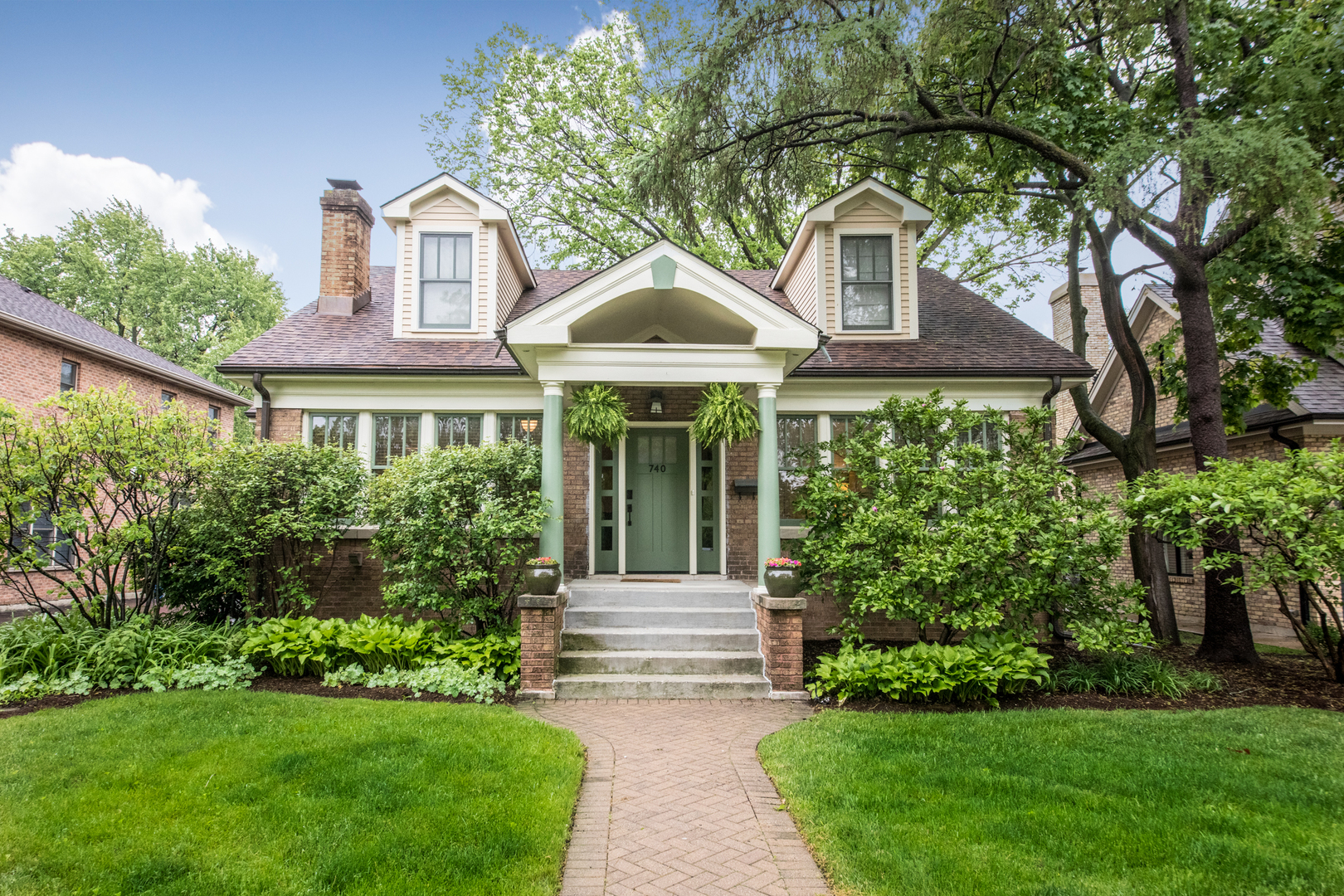 Classic 2 Story Craftsman Style Beauty in the Heart of the Country Club Area. This Remodeled Home Boasts a Gorgeous Hardwood Floor Living Room with Woodburning Fireplace and Large Dining Room which is Adjacent to the Custom Maple Cabinet Kitchen with Granite Counters, All Stainless Steel Appliances Including a Sub Zero Refrigerator, Top of the Line Gas Stove Top with Separate Oven, Dishwasher, and Disposal. The Adjoining Family Room is Perfect for  Entertaining as is the Heated All Season Sun Room that Opens to the Tiered Ipe Wood Deck with High Capacity Gas Line and Professionally Landscaped Yard with Full Irrigation System. The Half Bath and 1st Floor Bedroom Complete the First Floor. The Second Level Contains the Primary Bedroom with Walk-In Closet and Full Bath with Double Vanity Sinks. The Other 2 Bedrooms Have Easy Access to the Hall Bath. The Basement is Finished with a Recreation Room, Laundry Room, Storage Room and Outside Exit. The 2 Car Garage with Attached Heated and Air Conditioned Shop/Office was Built in 2010. All the Windows are Marvin with Insulating Glass and True Divided Lights. The Major Improvements are as Follows: Roof, Exterior Paint, Front and Back Doors with Electronic keyless Locks, Central Air all in 2020, 50 gallon Water Heater and Whole House Humidifier in 2021, Replace AC/Heat unit for the Garage Shop/Office in 2022. Seconds  from Northeast Park Featuring Pickleball, Tennis and Playground. Across the Street from Field Elementary School and Minutes away from Emerson Middle School, Prospect Park, Whole Foods, Trader Joe's, Uptown and the Metra! Just Move In and Enjoy the Quality and the Convenience!