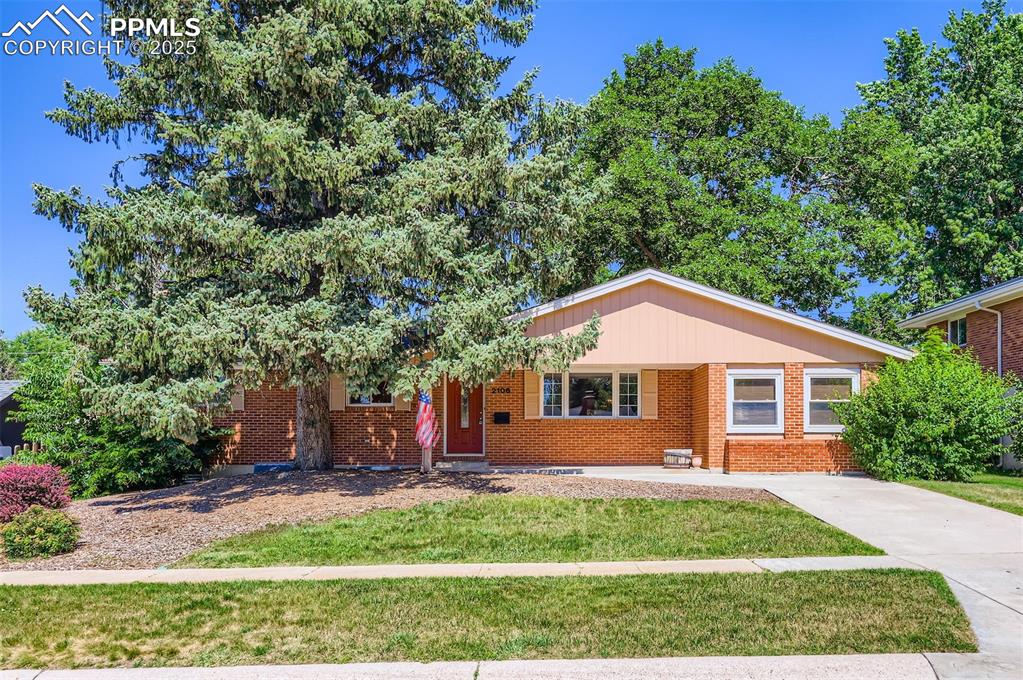 You found it... incredible opportunity to own a brick rancher in this incredible location. The value is fantastic here! Family and entertainment is the focus There is space for everyone! RV/Trailer parking on the front concrete slip. Expansive hardwoods, updated baths, kitchen, windows, detached large 2 car garage with alley accent * Solid counter surfaces, rich cabinetry, good counterspace, sparkling clean. All appliances included and clothes washer and dryer. Zeroscaped front yard w/ mature trees and covered porch * Lush and mature landscape with large covered patio, blooming perennials, shade trees, healthy lawn, fenced. The baths are updated and clean, modern, spacious. There are 5 bedrooms, 3 bathrooms, living room, dining room, family room and basement recreation room... the storage in this 3000+ square foot home is heavenly... the basement bedrooms can easily be considered an on-suite with the private layout. The fireplace is the cherry on top of this incredible property. 
Rare to find a loved and cared for updated property. This is the gem youve been searching for!

This home is generously appointed with over 3000 Square Feet! NO HOA!! Close to it all... PARKS, Shopping, restaurants, downtown, I-25, Palmer Park, UC Health Hopsital, Olympic Training Center, miles of trails out the front door, Patty Jewett Golf, Bowling, Monument Park and so much more. The easy life is right here in this Higland apark beauty. Don't forget to note the hardwood flooring, updates, garage space, fenced yard,  newer windows,  and amazing covered outdoor spaces, alley access.

Easy to see and easy to love!