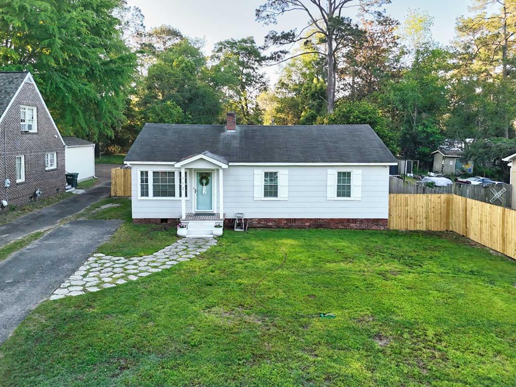 This charming cottage-style retreat is just minutes from downtown Thomasville! It's inviting 3-bedroom, 2-bath home blends classic character with everyday convenience — a short stroll to downtown shops and MacIntyre Park, and only a 7-minute drive to Publix. Inside, enjoy a bright, welcoming layout perfect for cozy nights and easy entertaining. Natural light fills the living spaces and the bedrooms offer comfortable, flexible layouts to suit family, guests, or a home office. The large master suite is right off the laundry room and offers a separate entrance on to the backyard patio.  Step outside to a generous, fully fenced backyard — your private oasis for gardening, play, and summer barbecues. A handy work shed provides extra storage or a creative workspace. Enjoy small-town charm with city conveniences — a delightful home for those seeking comfort, character, and a prime Thomasville location. Schedule a viewing today!